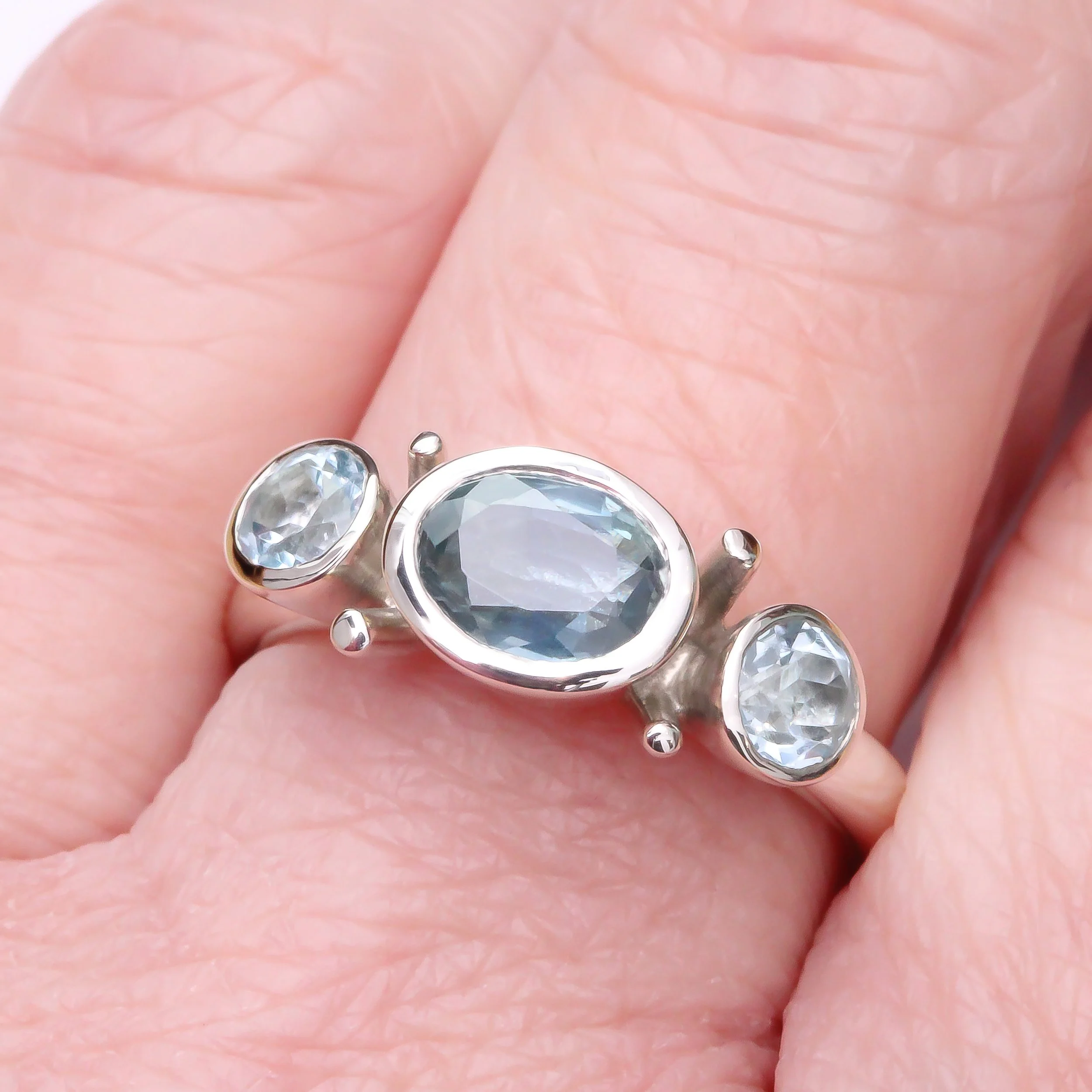Silver Sapphire & Topaz - hand.jpg
