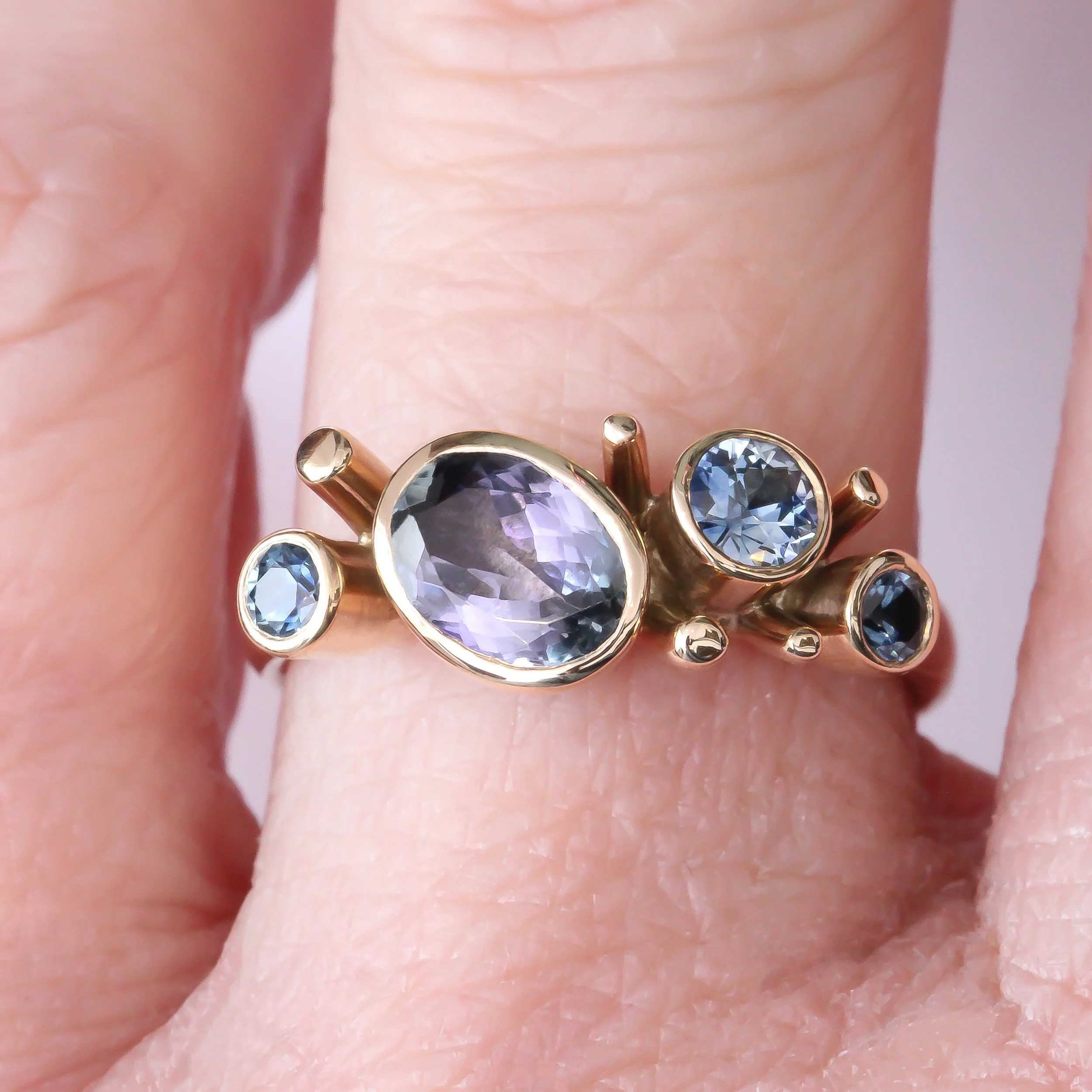 9Y Tanzanite & Sapphire - hand.jpg