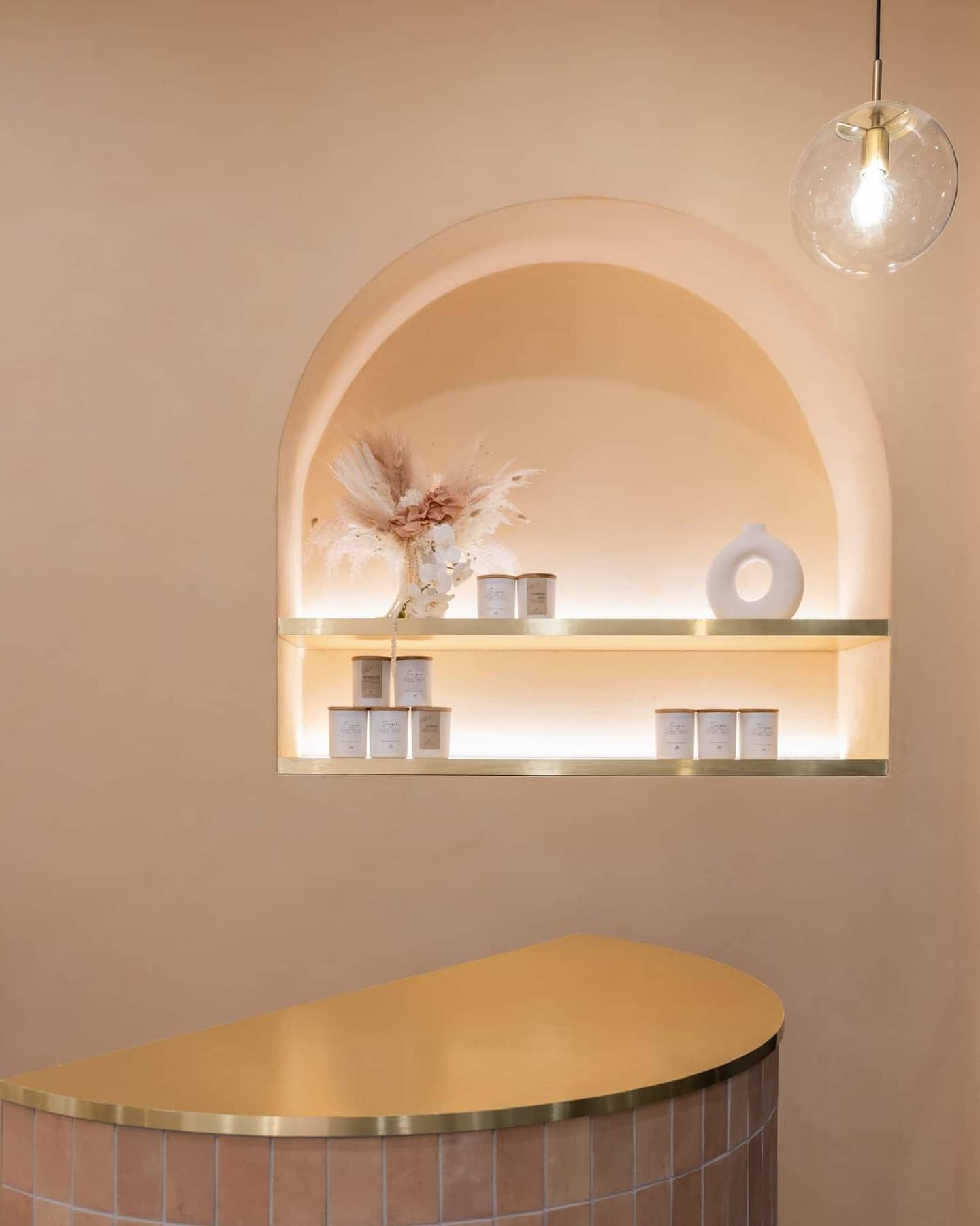 An arch nook display recessed into the entry wall was created to feature our clients locally made Australian candles. What do you think? We personally love this creative solution which provided more retail display in a relatively small space. 
@wynte