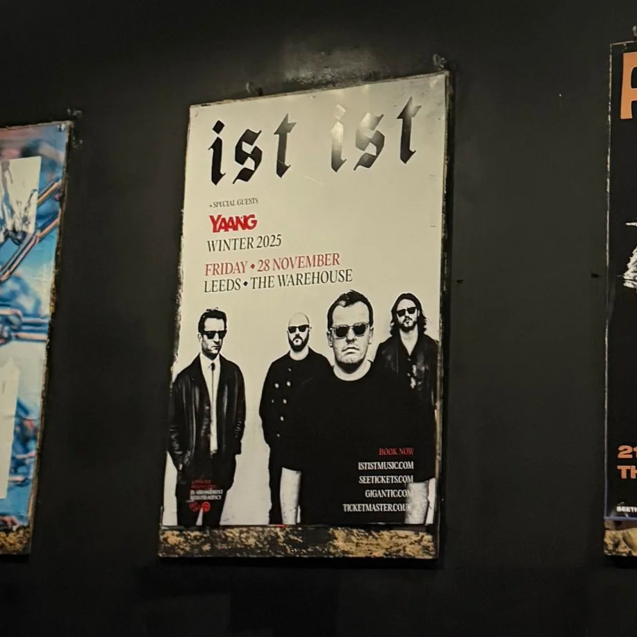 Poster promoting a concert featuring the band 'Ida' in Leeds on November 28, 2025, with four band members wearing sunglasses and dark clothing, event details, and ticket information displayed.