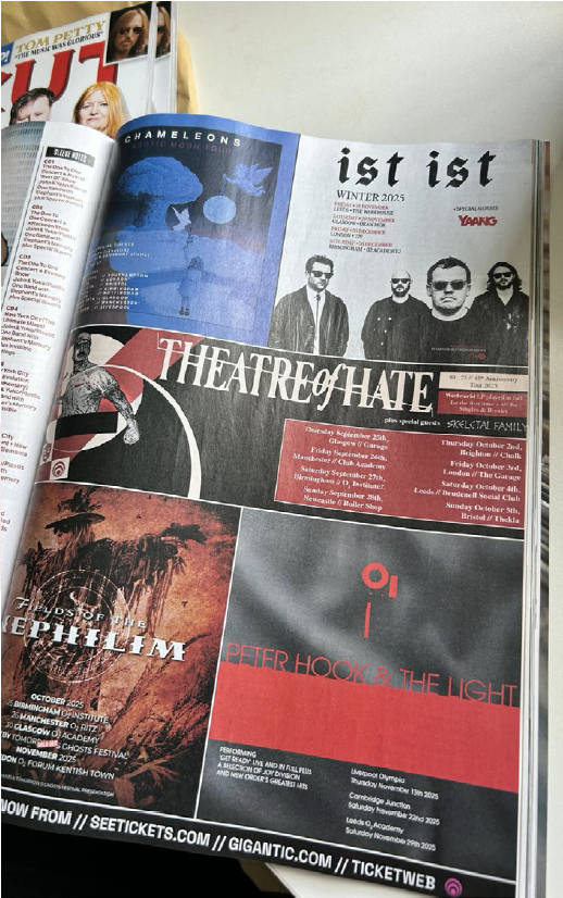 A magazine open to a page featuring concert and event advertisements, including bands such as Chameleons, Theatre of Hate, and Peter Hook & The Light, with tour dates and locations listed.