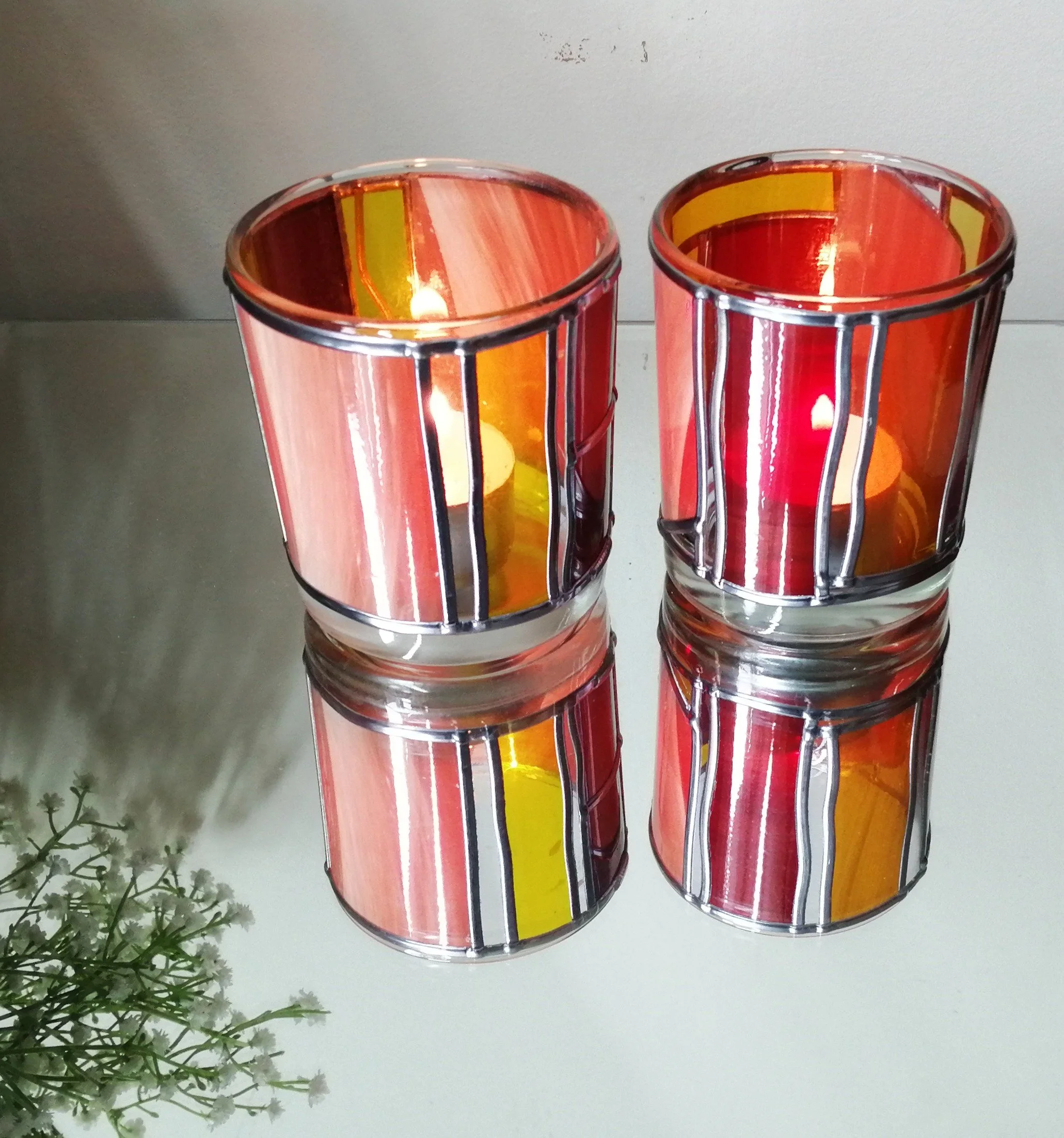 Set B  is a set of stained glass effect candle holders