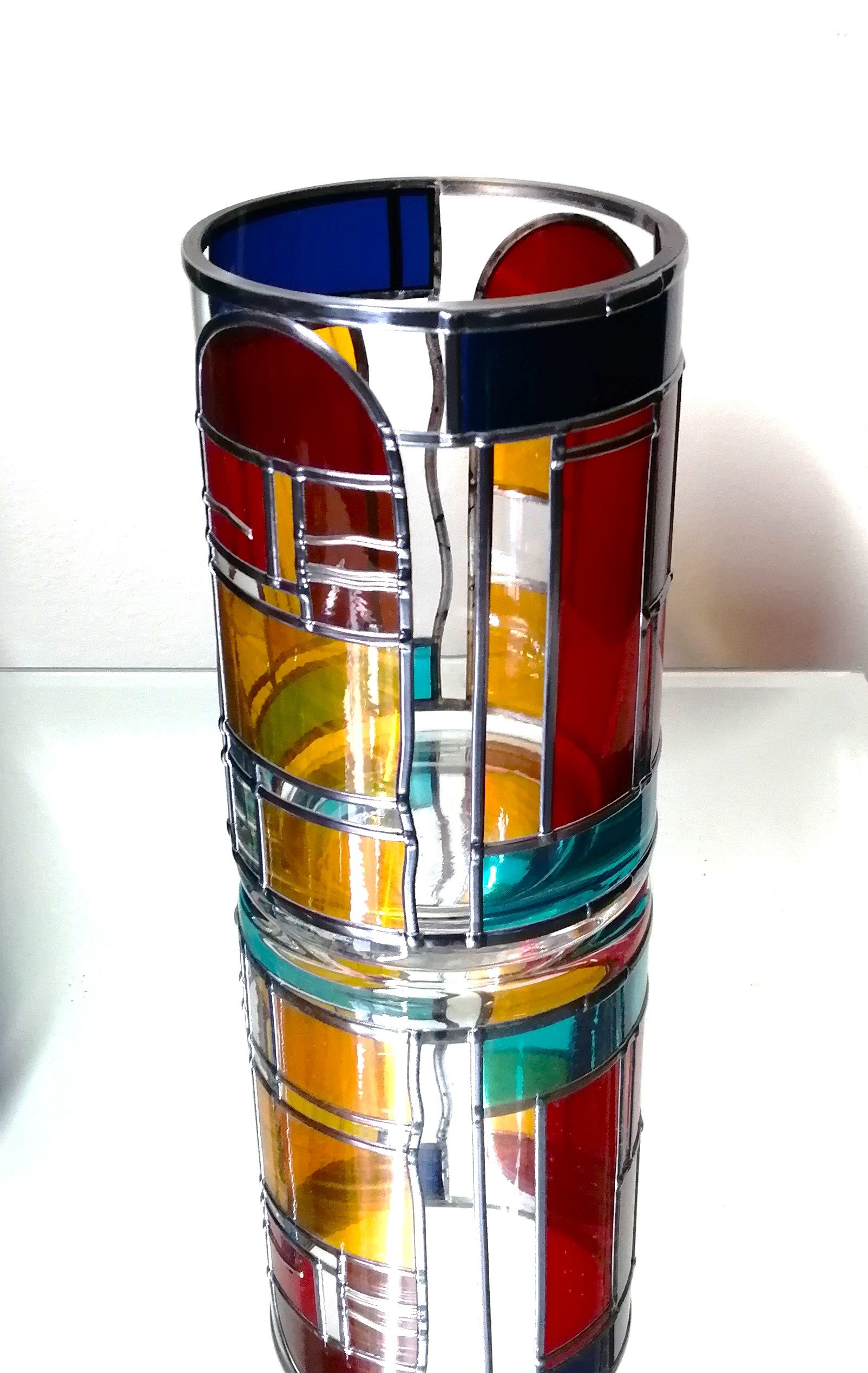 India is a Vibrant Art Deco Style Stained Glass Effect Flower Vase.