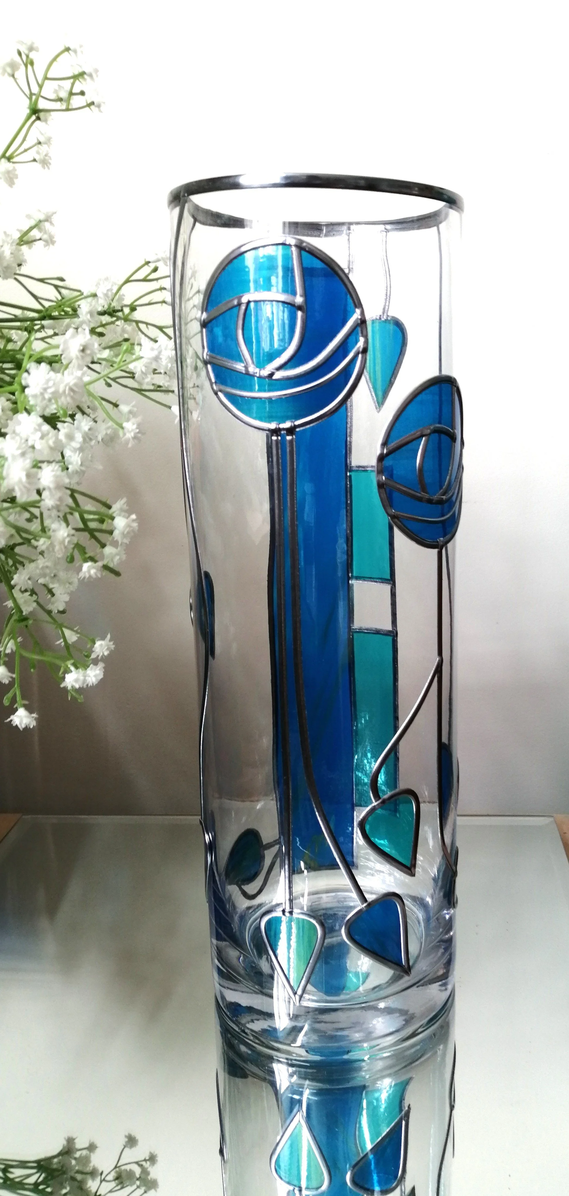 Moderne Art Deco is a Mackintosh-inspired stained glass effect flower vase.
