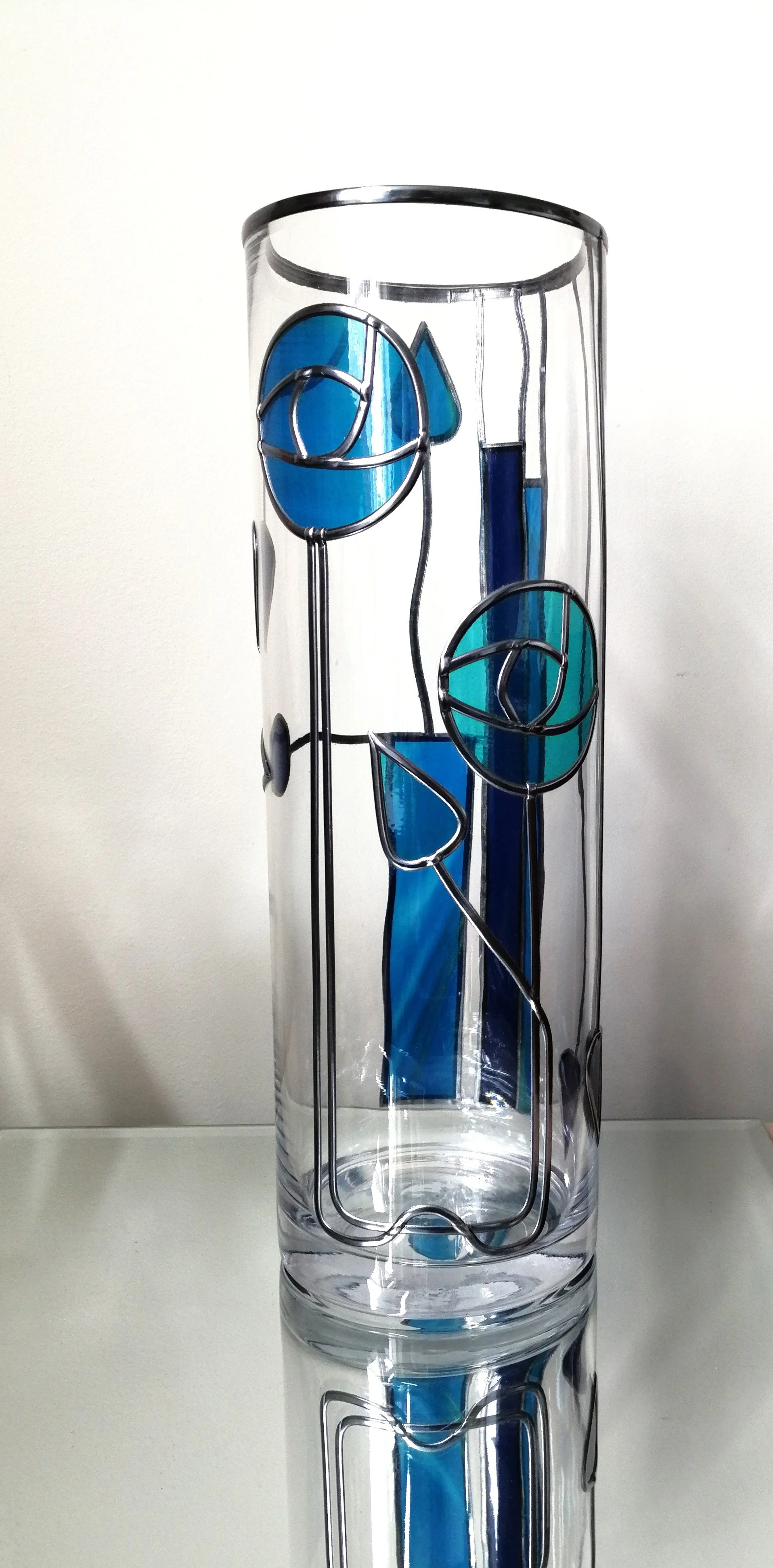 Moderne Art Deco is a Mackintosh-inspired stained glass effect flower vase.