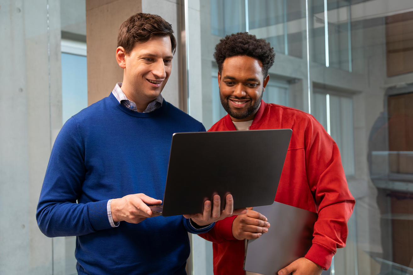 Office Tripped - IT Expert Assisting Employee in Boardroom.png
