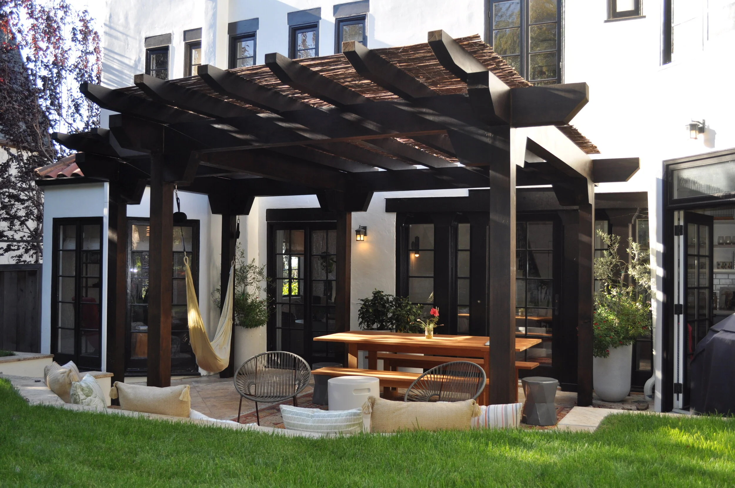 A Mediterranean trellis in Piedmont: sturdy enough to support a hammock.
