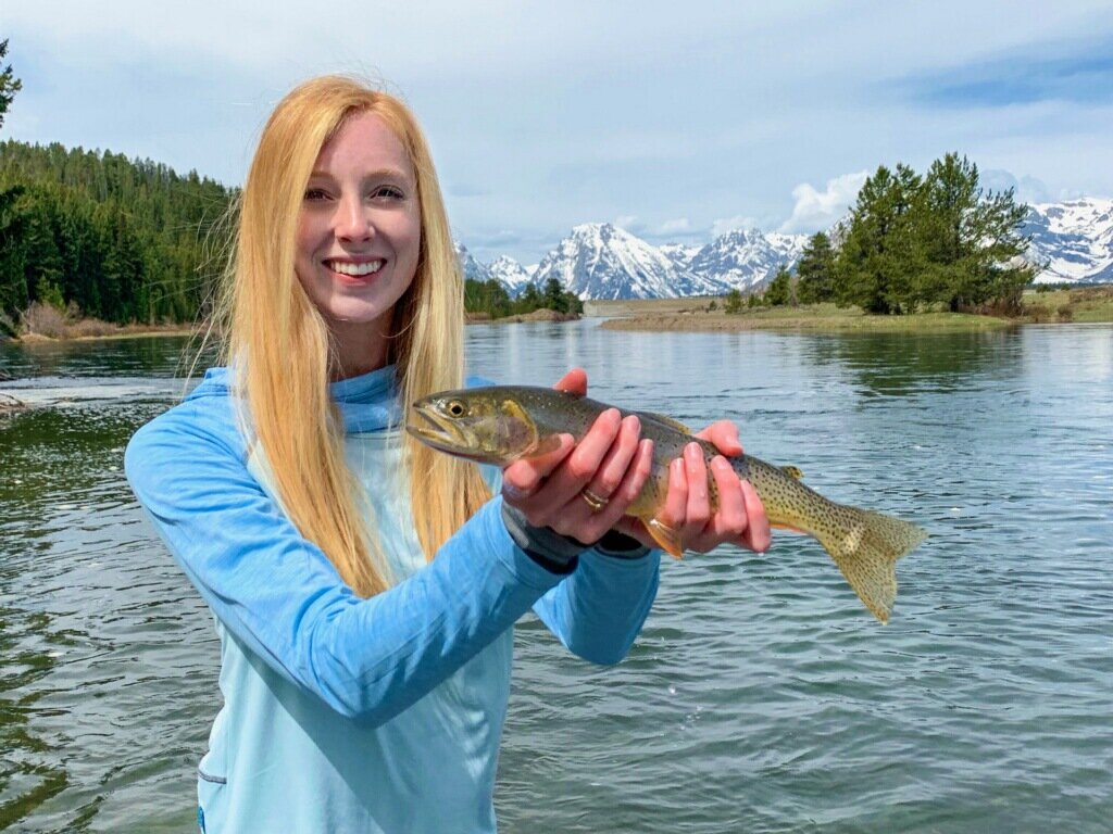  Maggie with a cutthroat trout from the Snake River. 