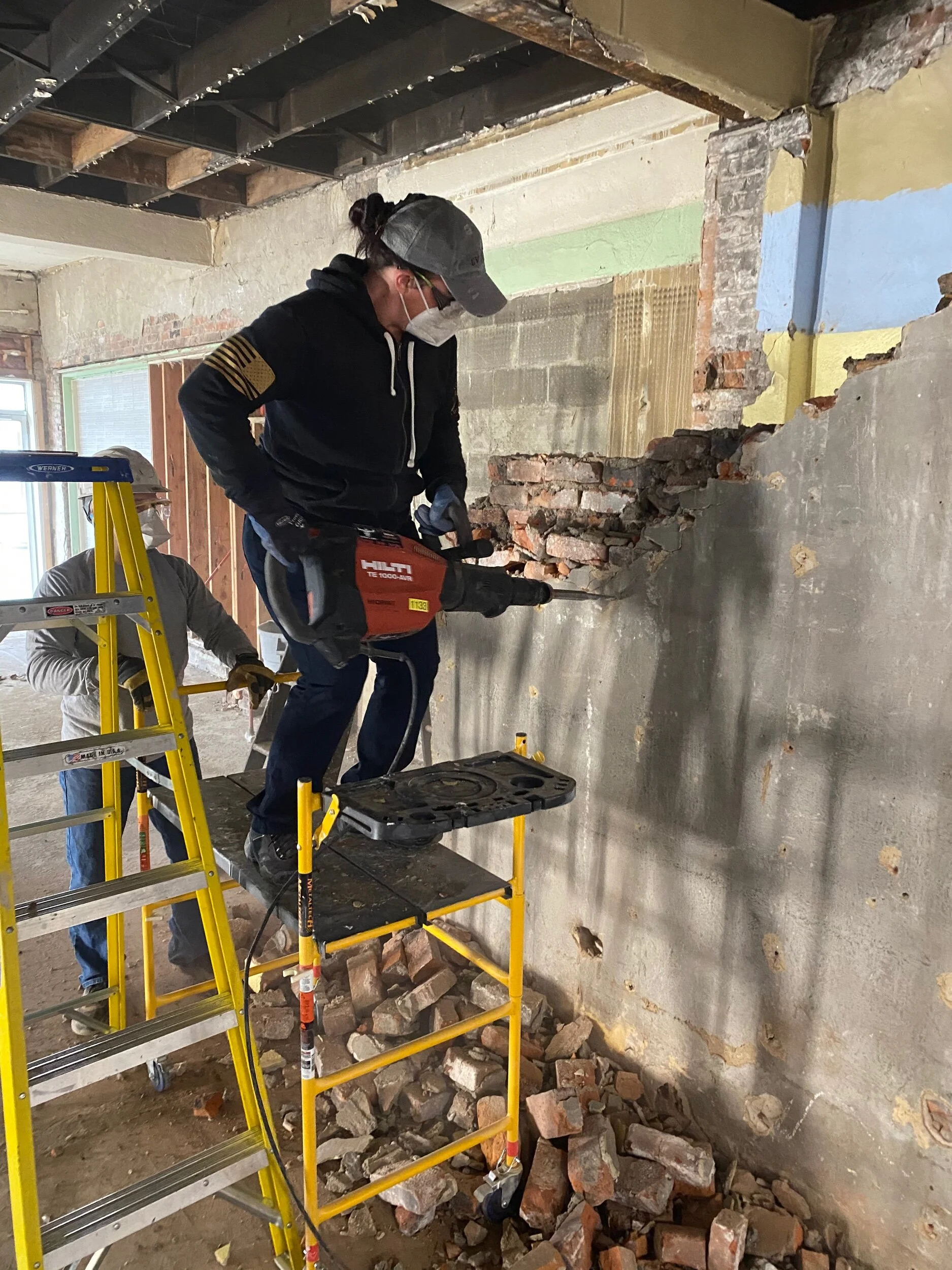 Dismantling an interior brick room that was non-structural.