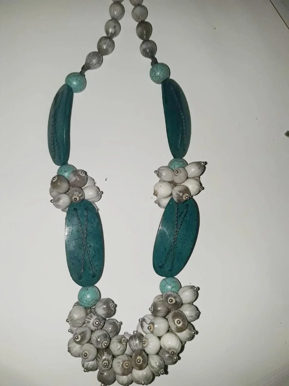 Necklace made of coconut pieces and Saint Peter seeds