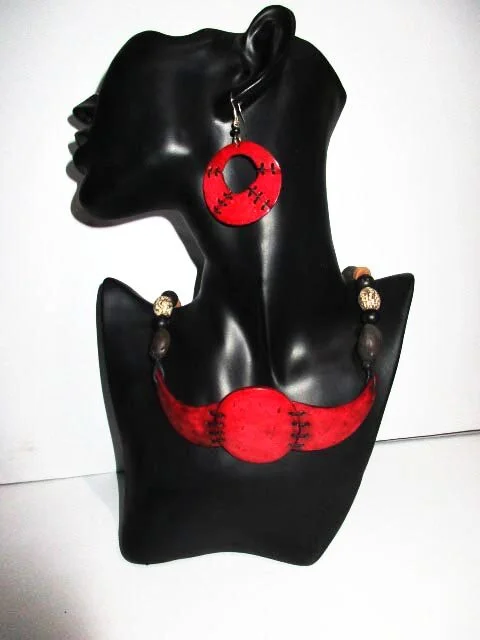 Set of decorated coconut circle charm necklace and earrings