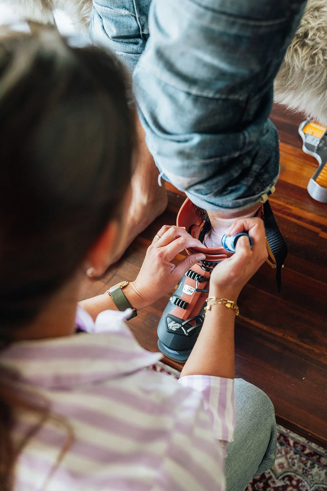 ski podiatrist assessing a ski boot
