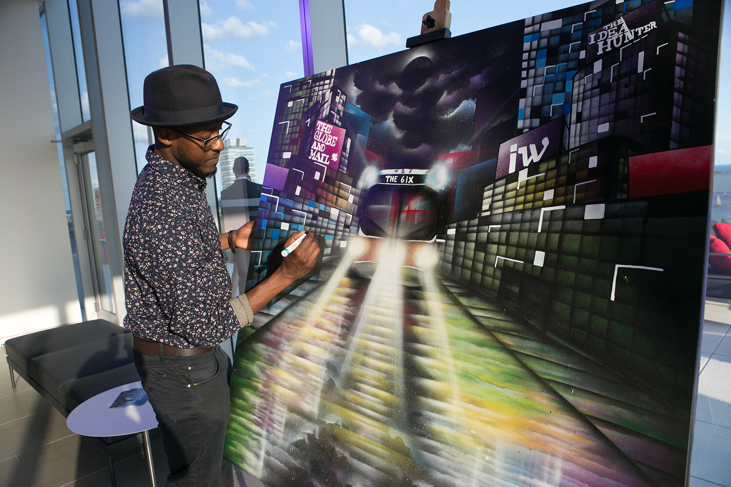 Let your guests channel their inner artist while collaborating with a live painter.