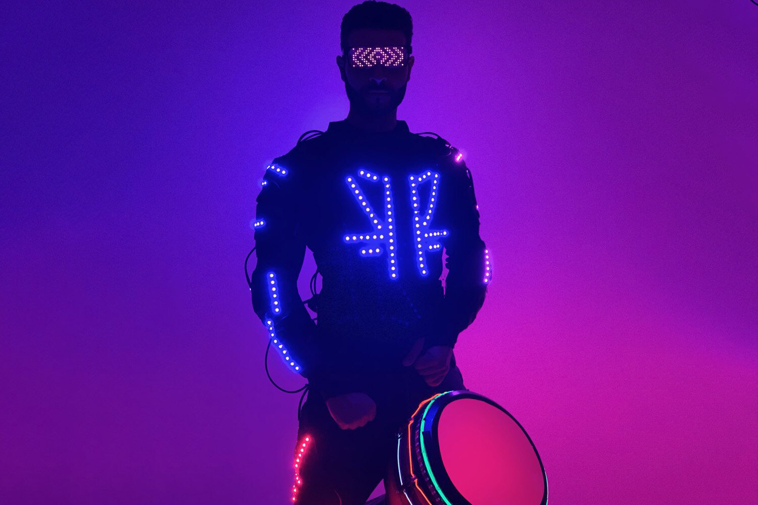Our high-impact LED bongo player will light up the stage while drumming to the beat of the music.