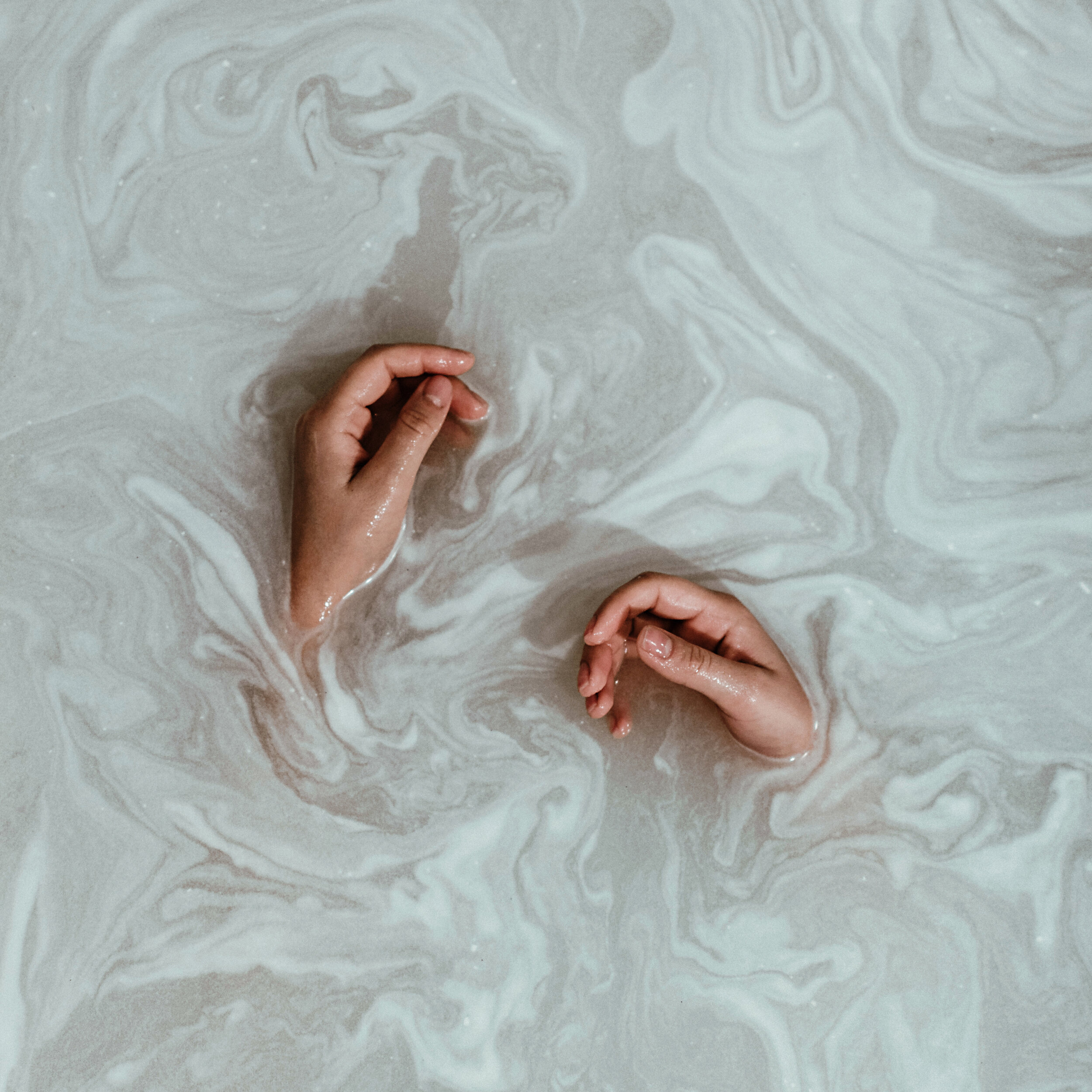 Canva - Person's Hands In The Water.jpg