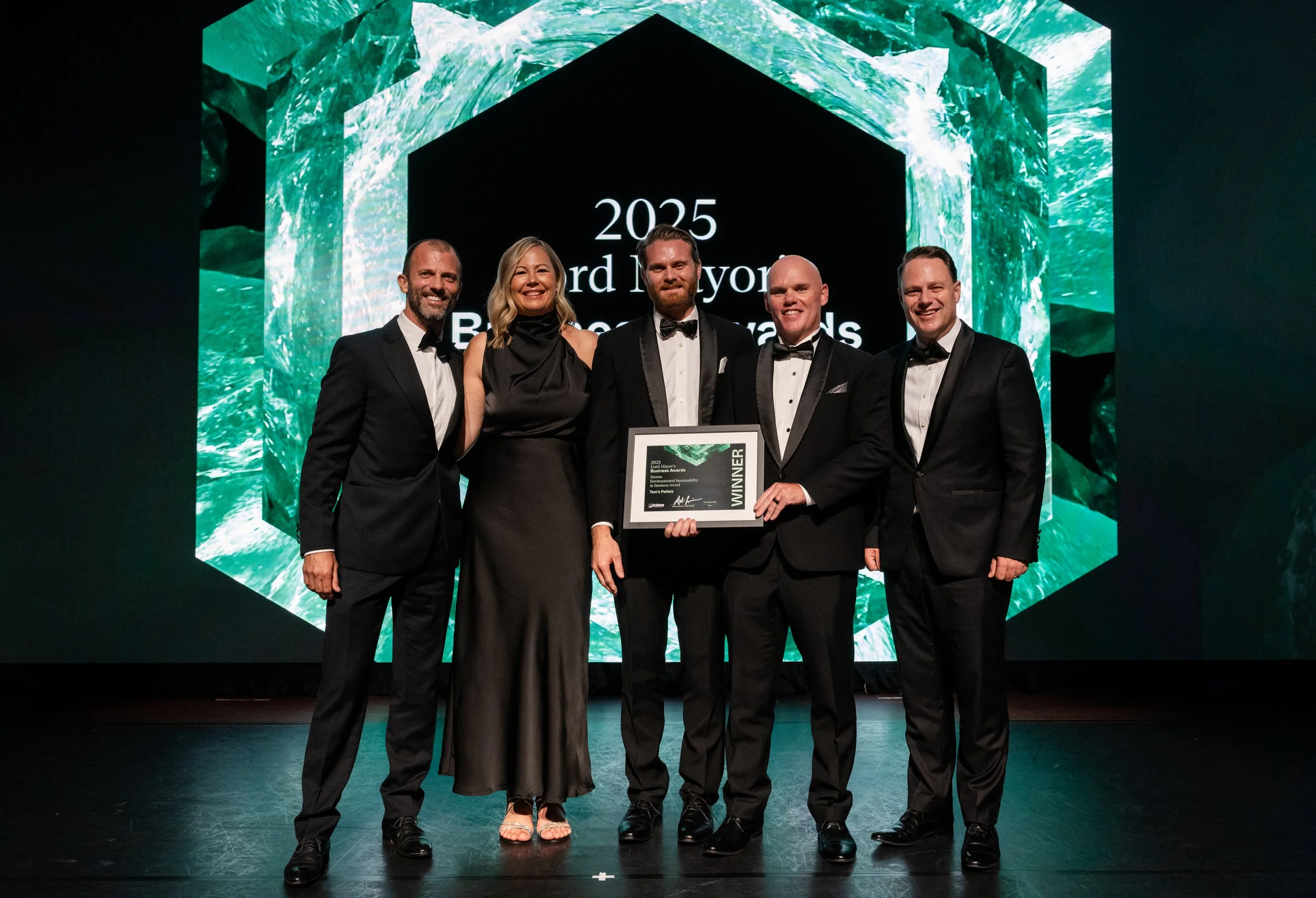 Tom's Pallets employees accepting the award from Lord Mayor and sponsor Chris Ernst