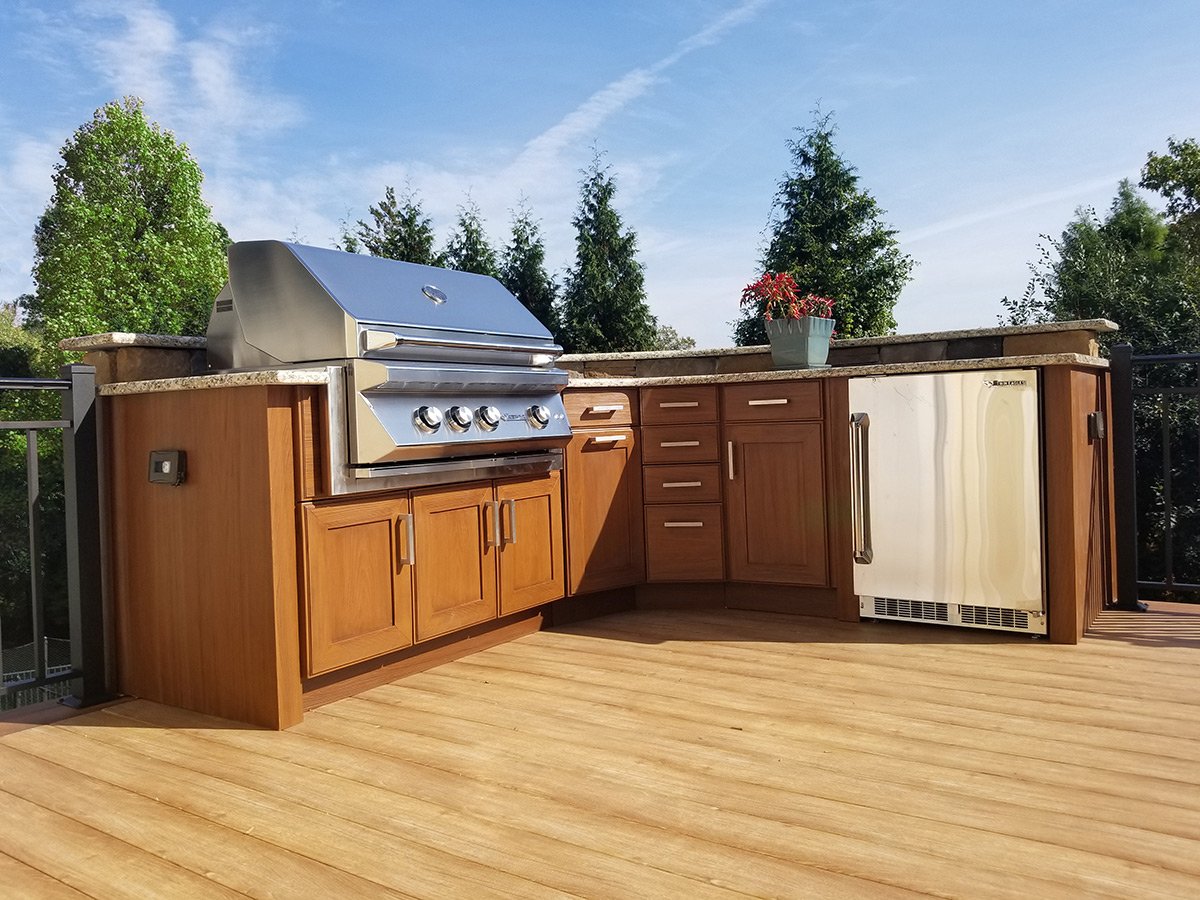 weatherproof-outdoor-kitchen-on-deck-shaker-walnut.jpg