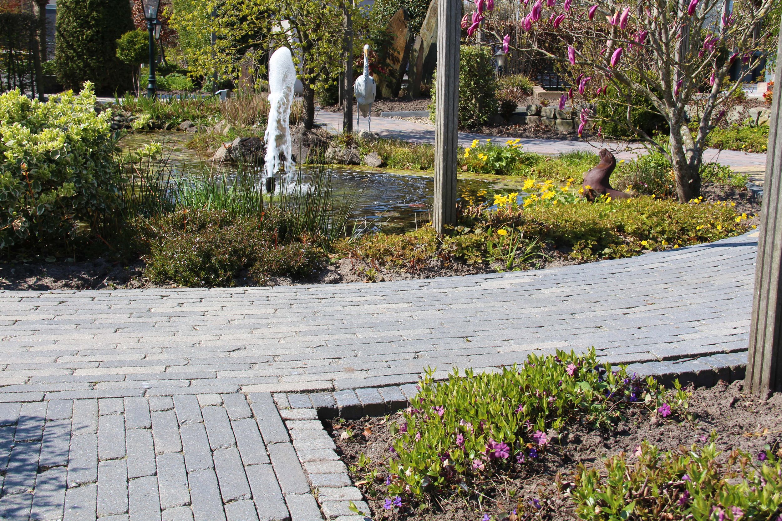 Getrommelde bestrating laten leggen