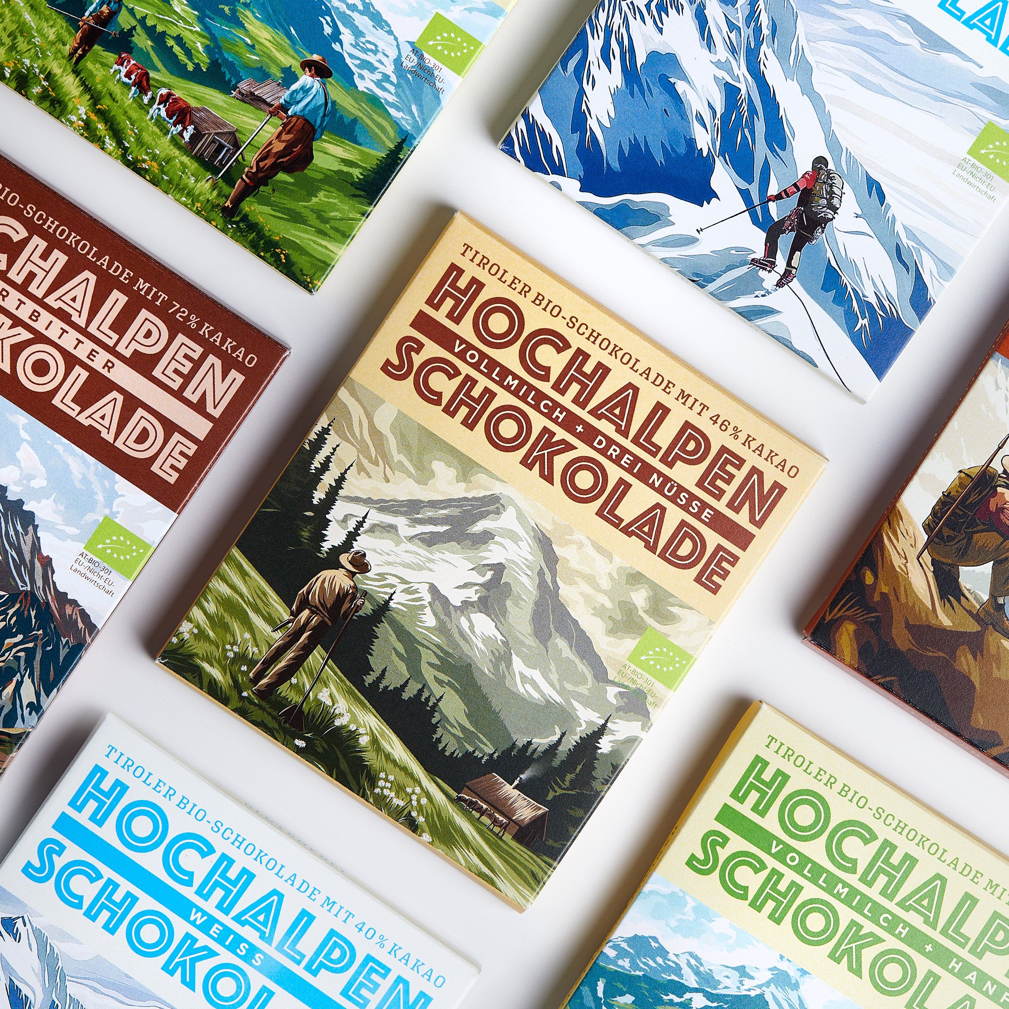 Verschiedene Schokoladentafeln mit Alpenmotiven und Bergpanoramen. Fotografiert von Sarah Neuner.