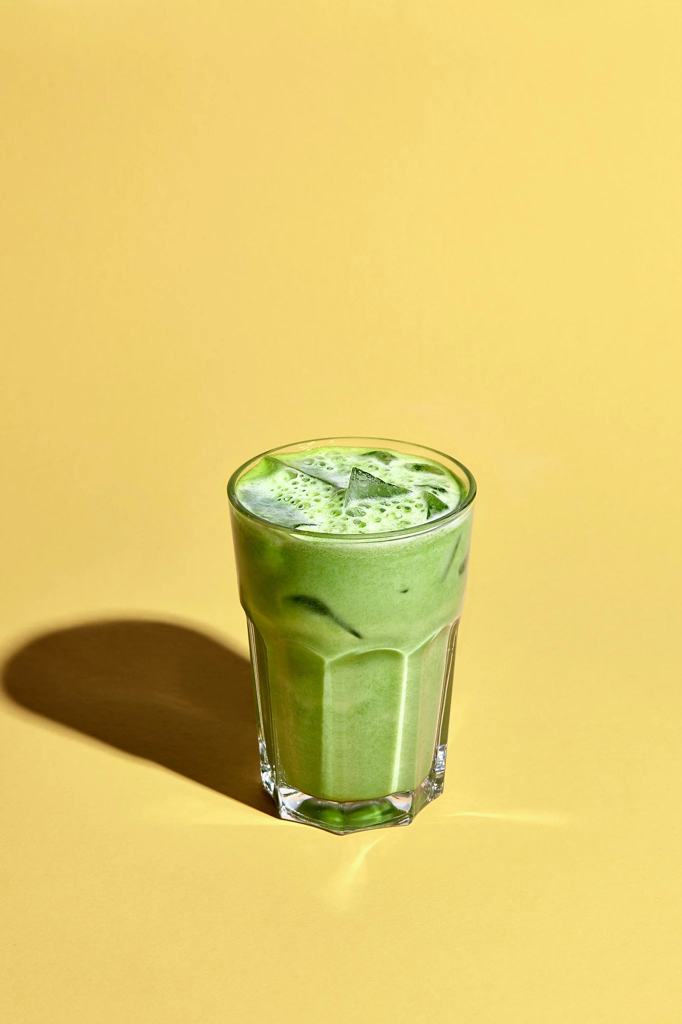 Green juice with ice by Sarah Neuner Photography