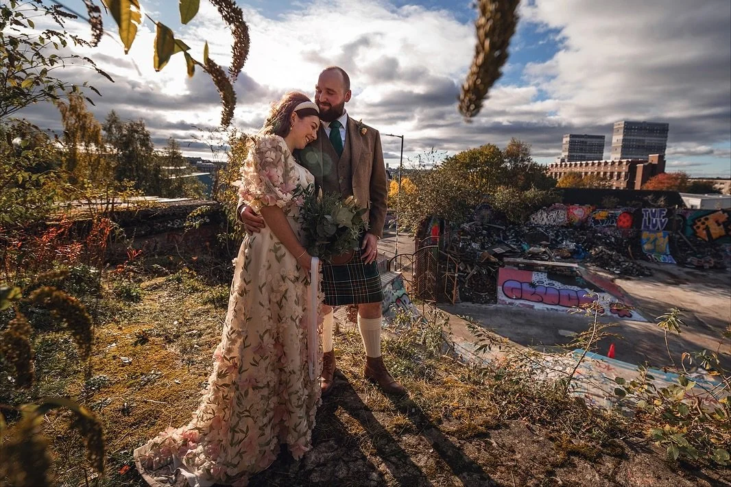 Happy Anniversary Hannah and Ben! π§‘ Stunnin in the Autumn sun at @arches_diy 
πΈ @alasdair_watson 
π @rowanjoy 
ππ»‍βοΈ @fundamentalsalon_ 
π @creature.flowers 
π
π» @cutebutdeadly.nailco 
Celebrant - @mandy.evans.ewing 
π°π»‍βοΈ @hannahgra
