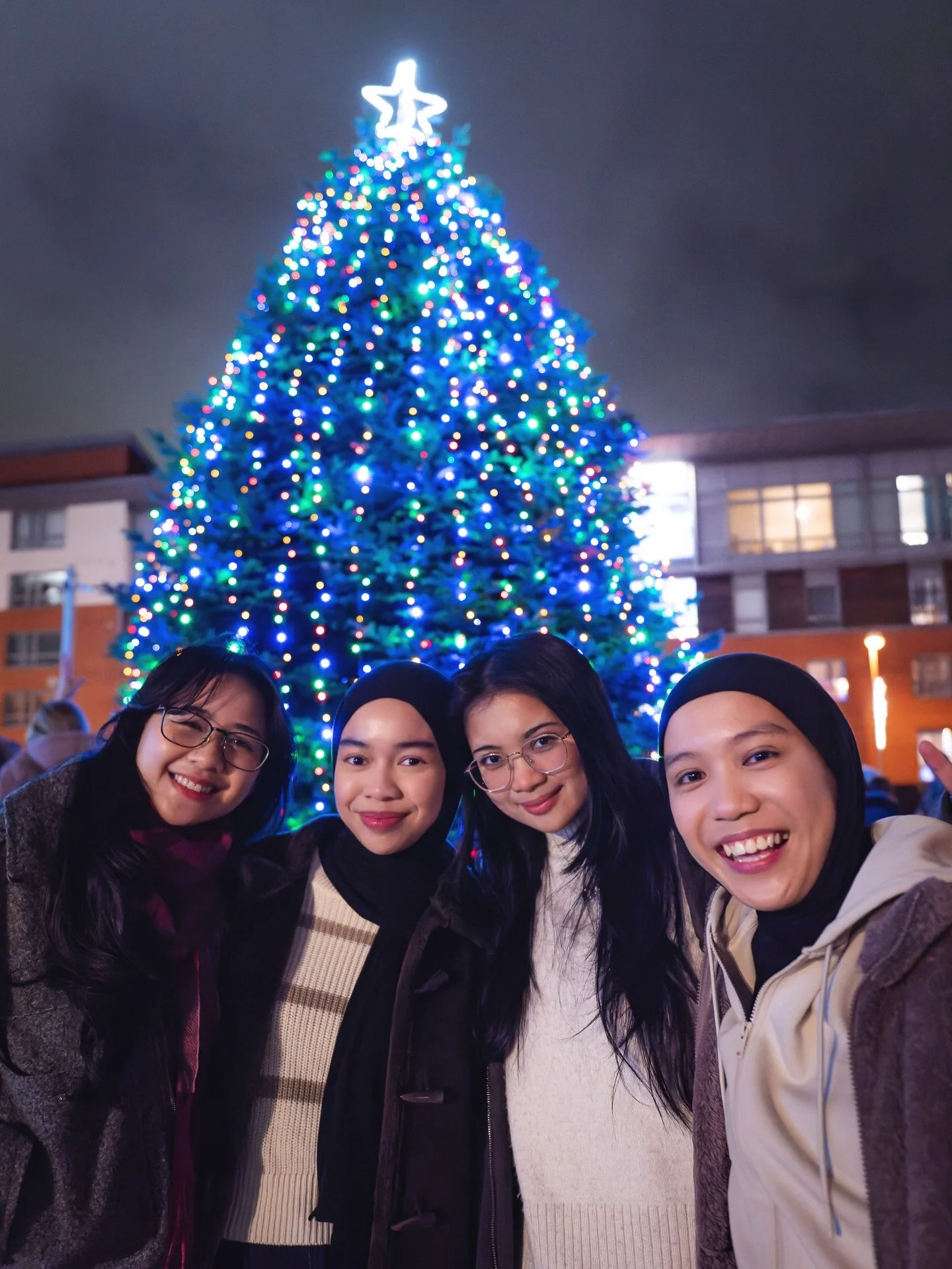 Swipe to turn on the Gorbals Christmas lights, and see how much fun the community has every year. Can&rsquo;t recommend it enough, and such a great bunch of neighbours to collaborate on festive photos with, including @givin_it_laldie @citizenstheatre