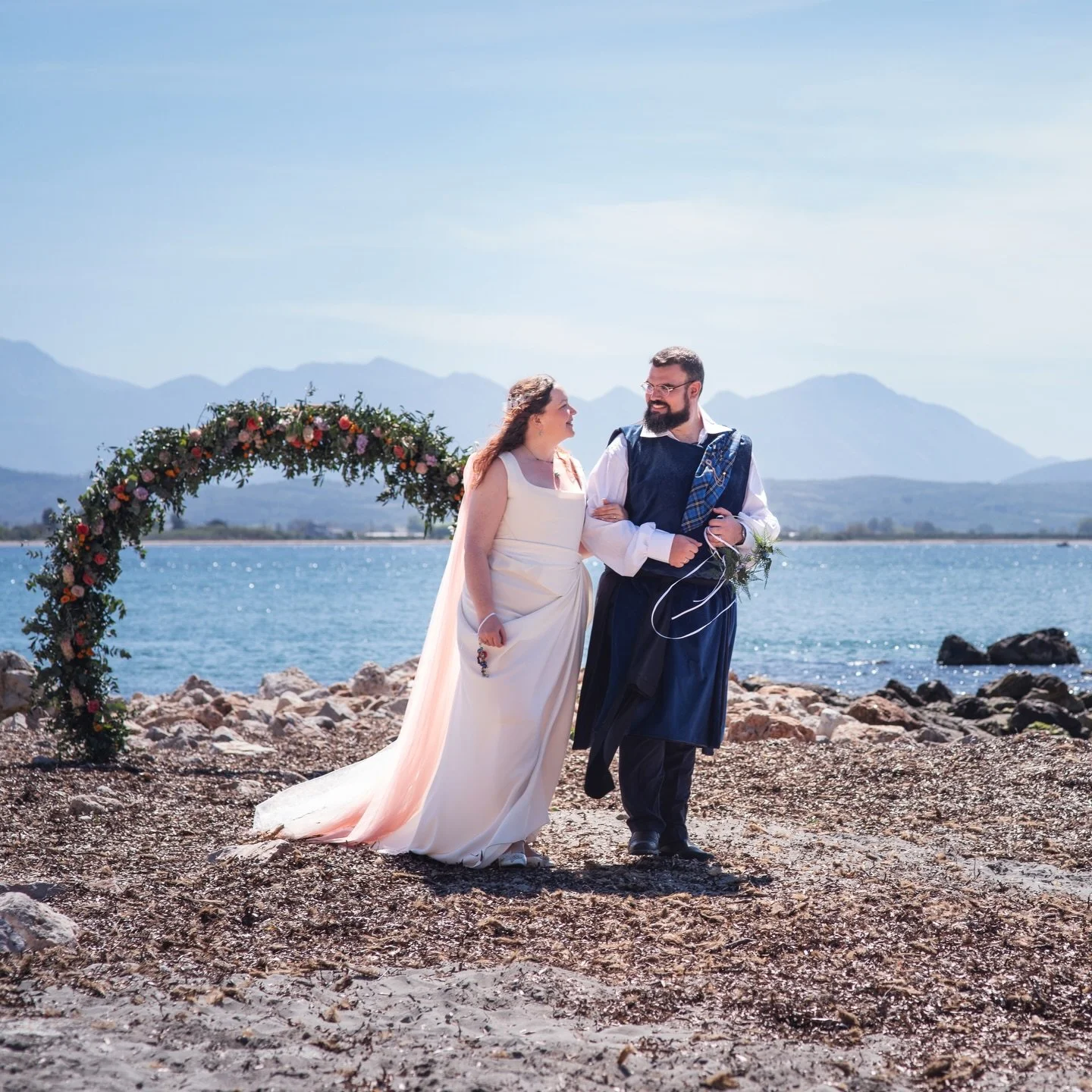 I can absolutely recommend getting married on the beach in Greece (and when you do, bring me with you to photograph it 😍)
Jessie &amp; Dimitrios, stunning in the sun ☀️ 
.
.
.
#scottishweddingphotographer #destinationweddingvideographer #beachweddin