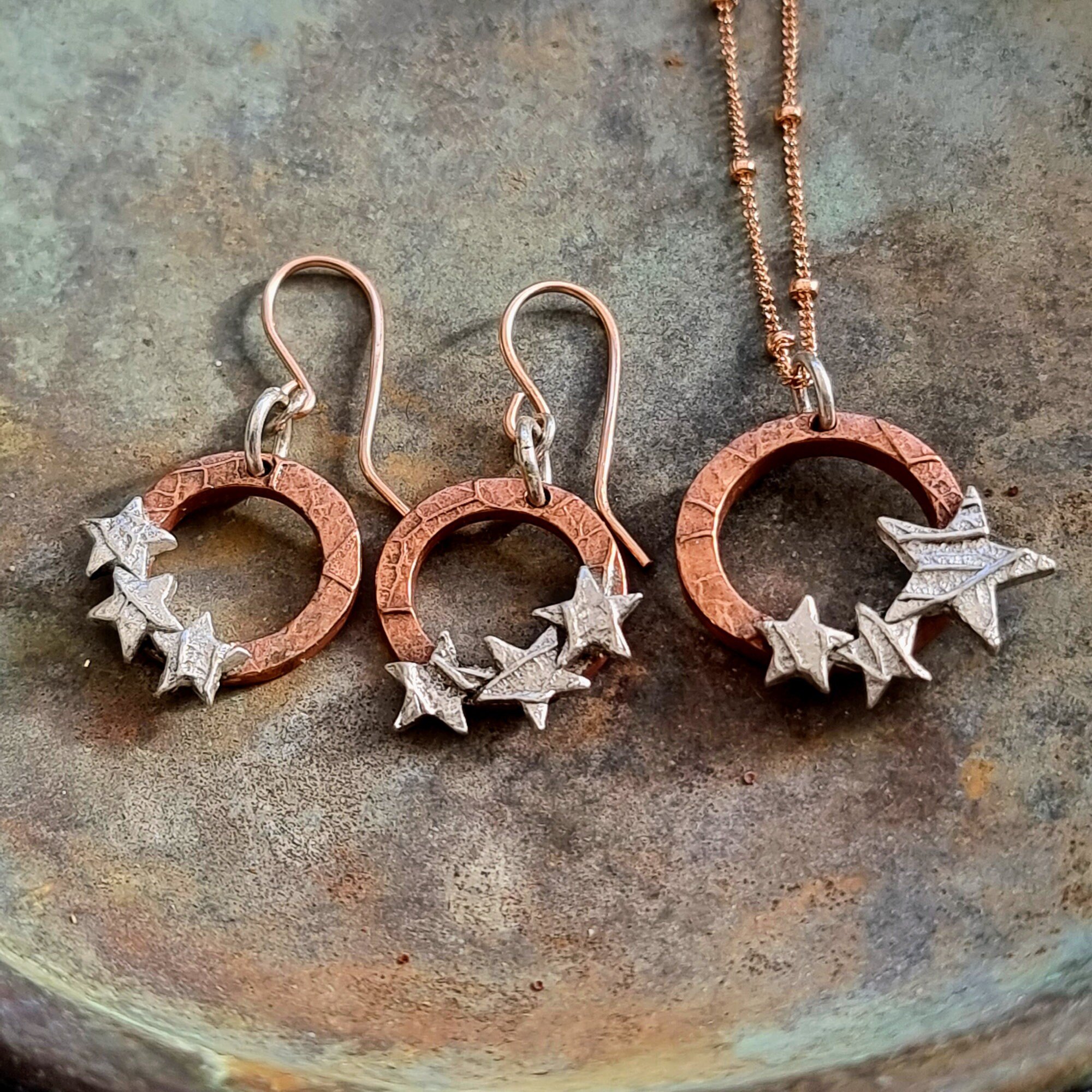 Silver and copper star hoop drop earrings with matching necklace