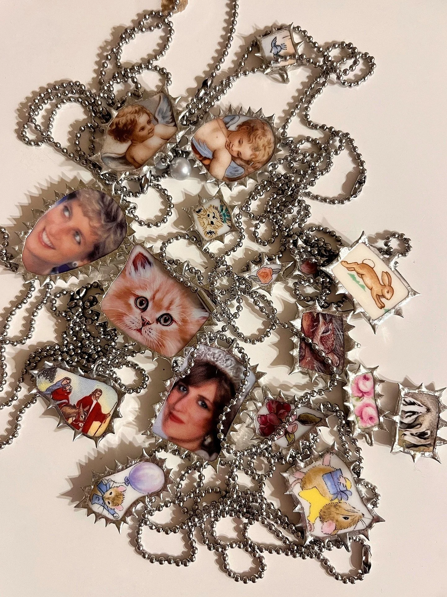 The final mini drop of the year is now live! There are pendants, earrings, badges and a brooch available. 🤍 Link in bio ⛓️&zwj;💥🪽