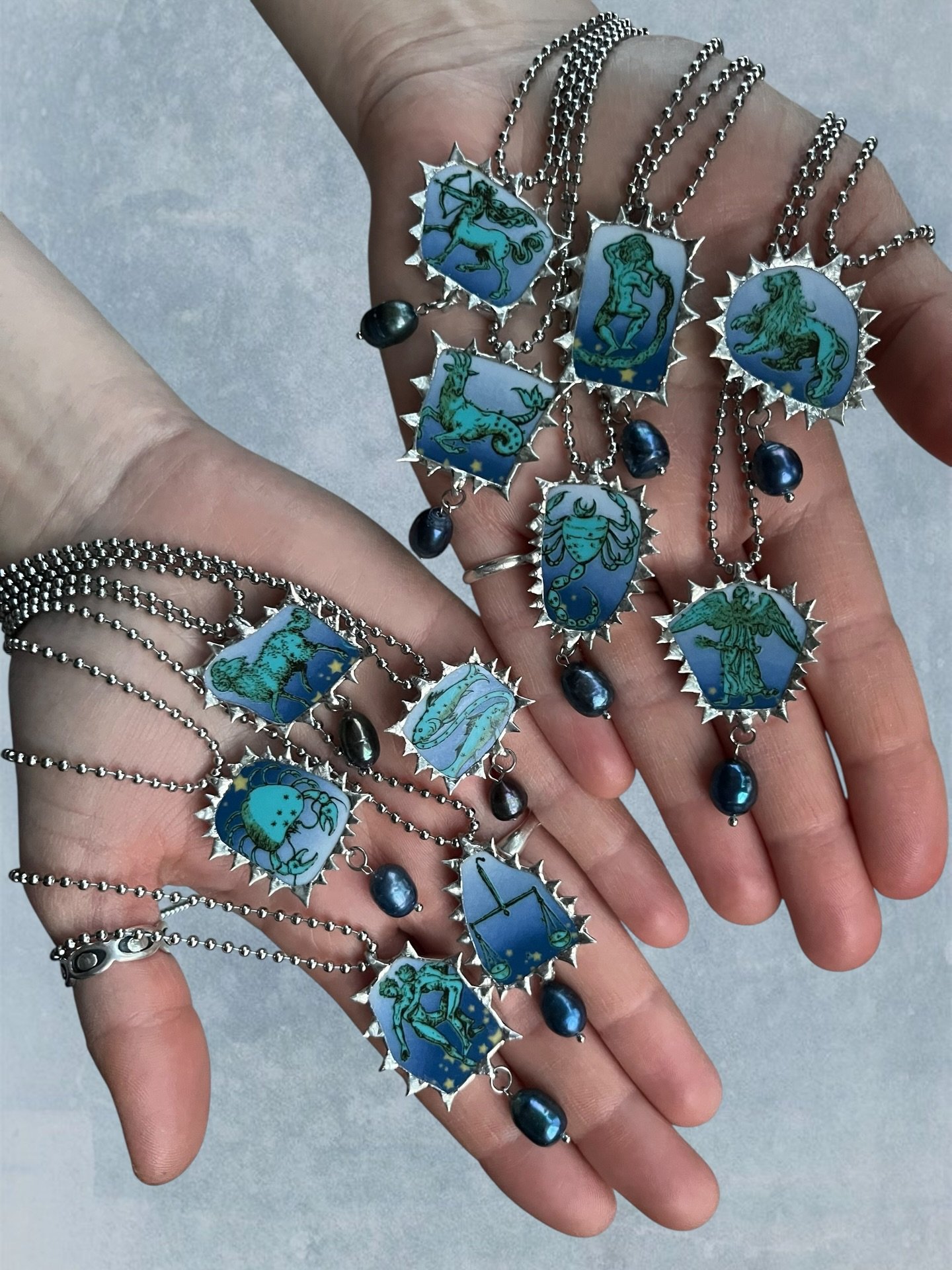 𝕿𝔥𝖊 𝕬𝔰𝖙𝔯𝖔𝔩𝖔𝔤𝖞 𝕮𝔬𝖑𝔩𝖊𝔠𝖙𝔦𝖔𝔫 is now available on my website. There are necklaces and three pairs of earrings, all made from one plate!

My apologies to the Taurus brigade, whilst cutting the plate the Taurus ceramic piece seemed to 