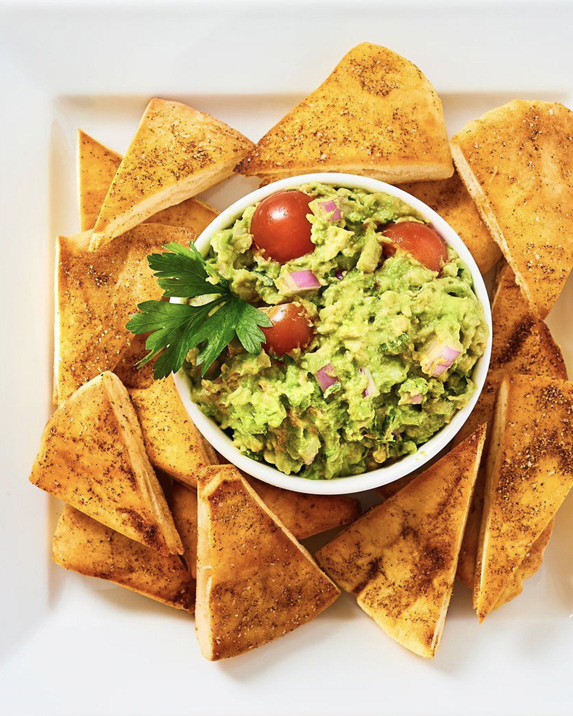 Zesty Guacamole with Spiced Pita Chips Recipe — Bite Me More