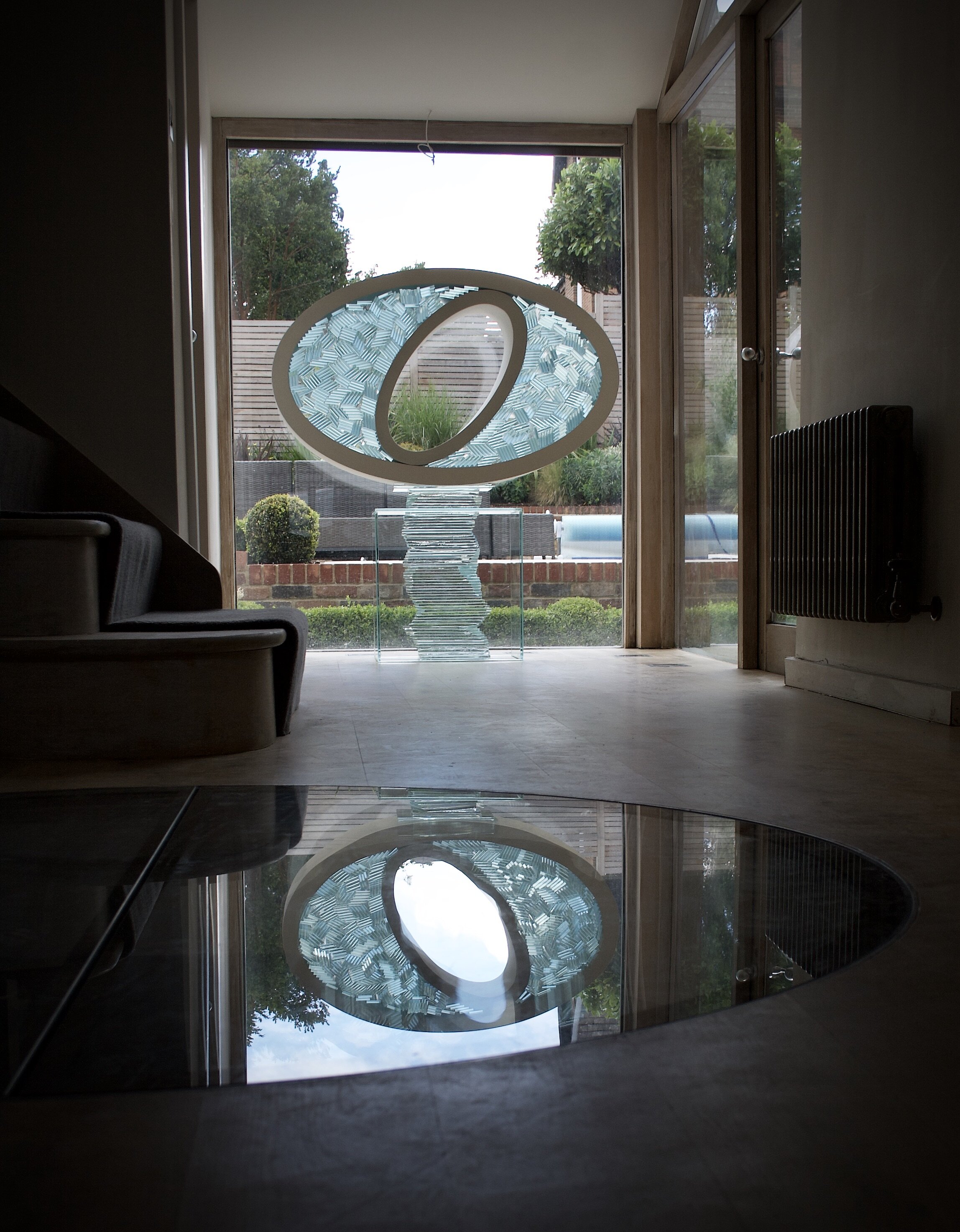 Through the Eye. Jesmonite and plate glass