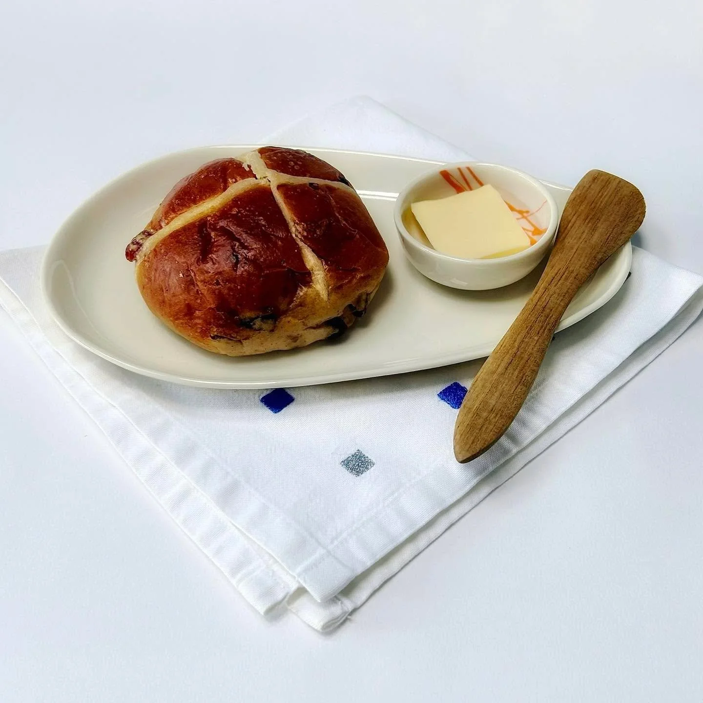 I love Nigel Slaters description of how to achieve perfection when splitting and toasting a hot cross bun in his book &lsquo;A thousand feasts&rsquo;.

&ldquo;Perfection is when you manage to catch the bun just as the butter has formed a golden pool 