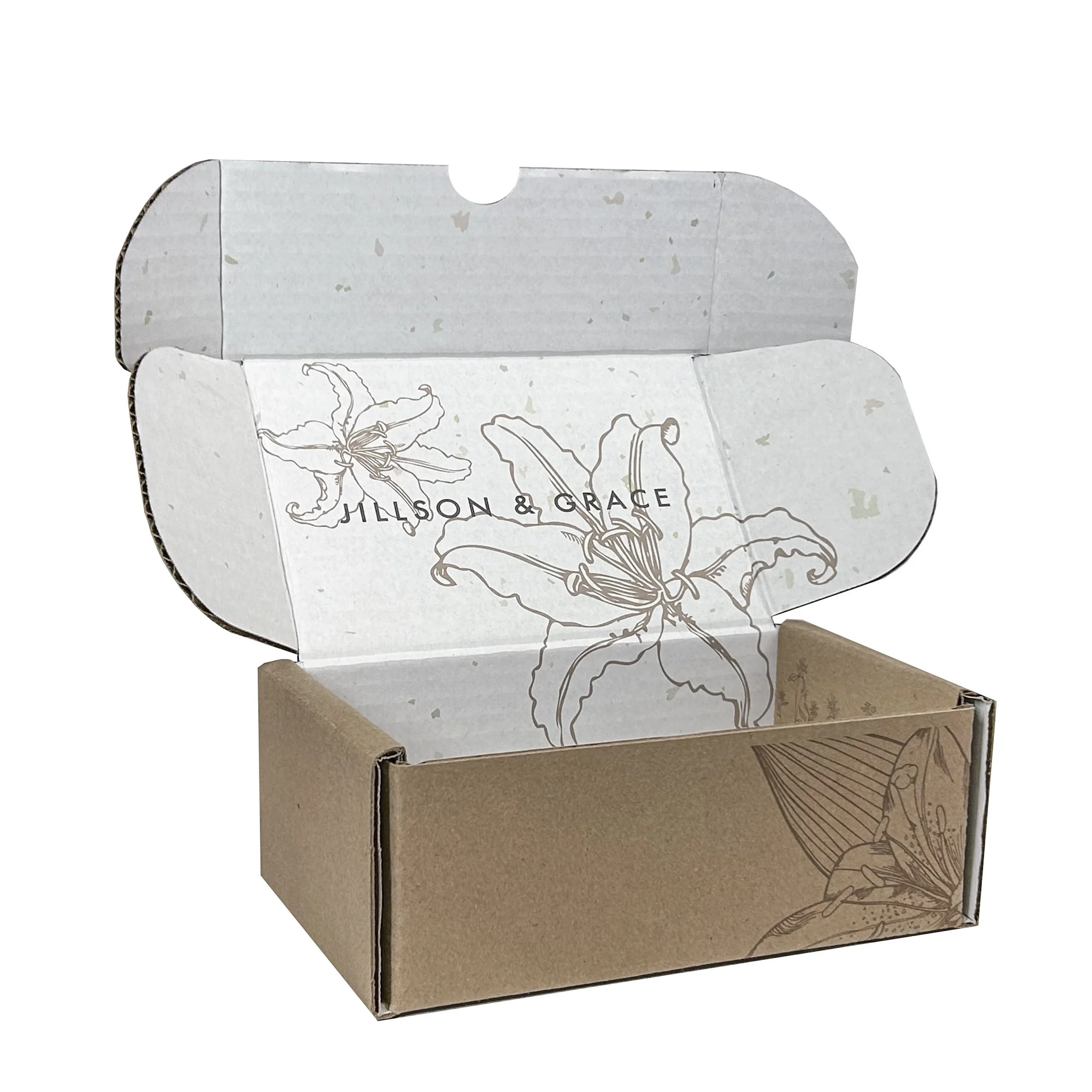 Open corrugated box with floral design and the words 'JILLSON & GRACE' inside.