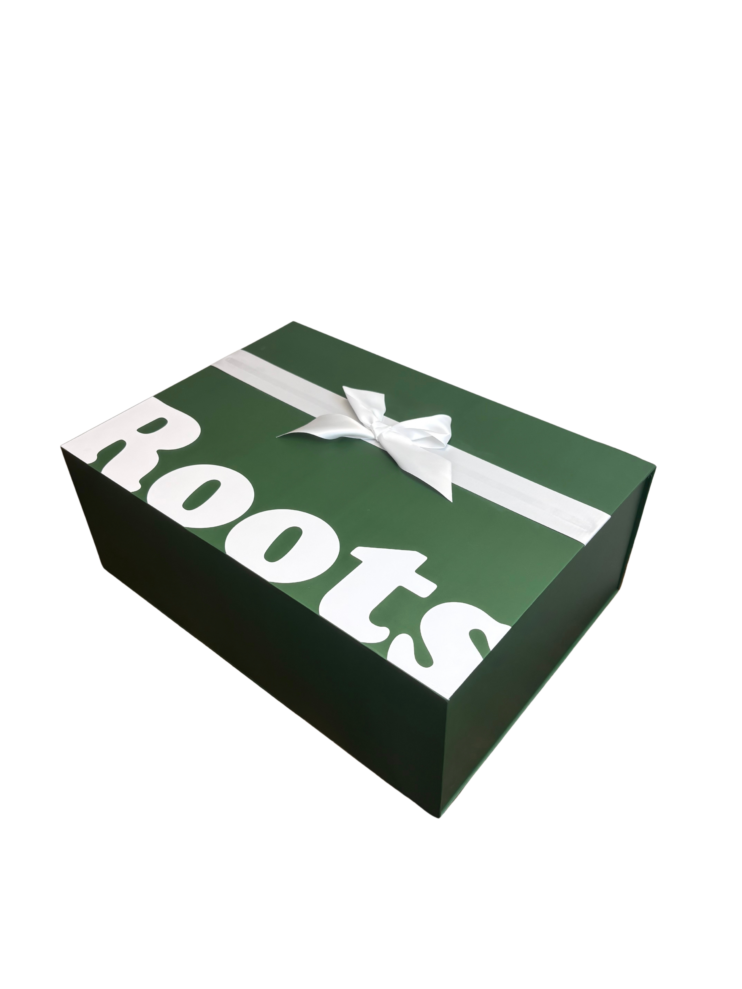 A green shoebox with white lettering and a white ribbon tied in a bow on top.  influencer boxes A&H packaging roots collaboration