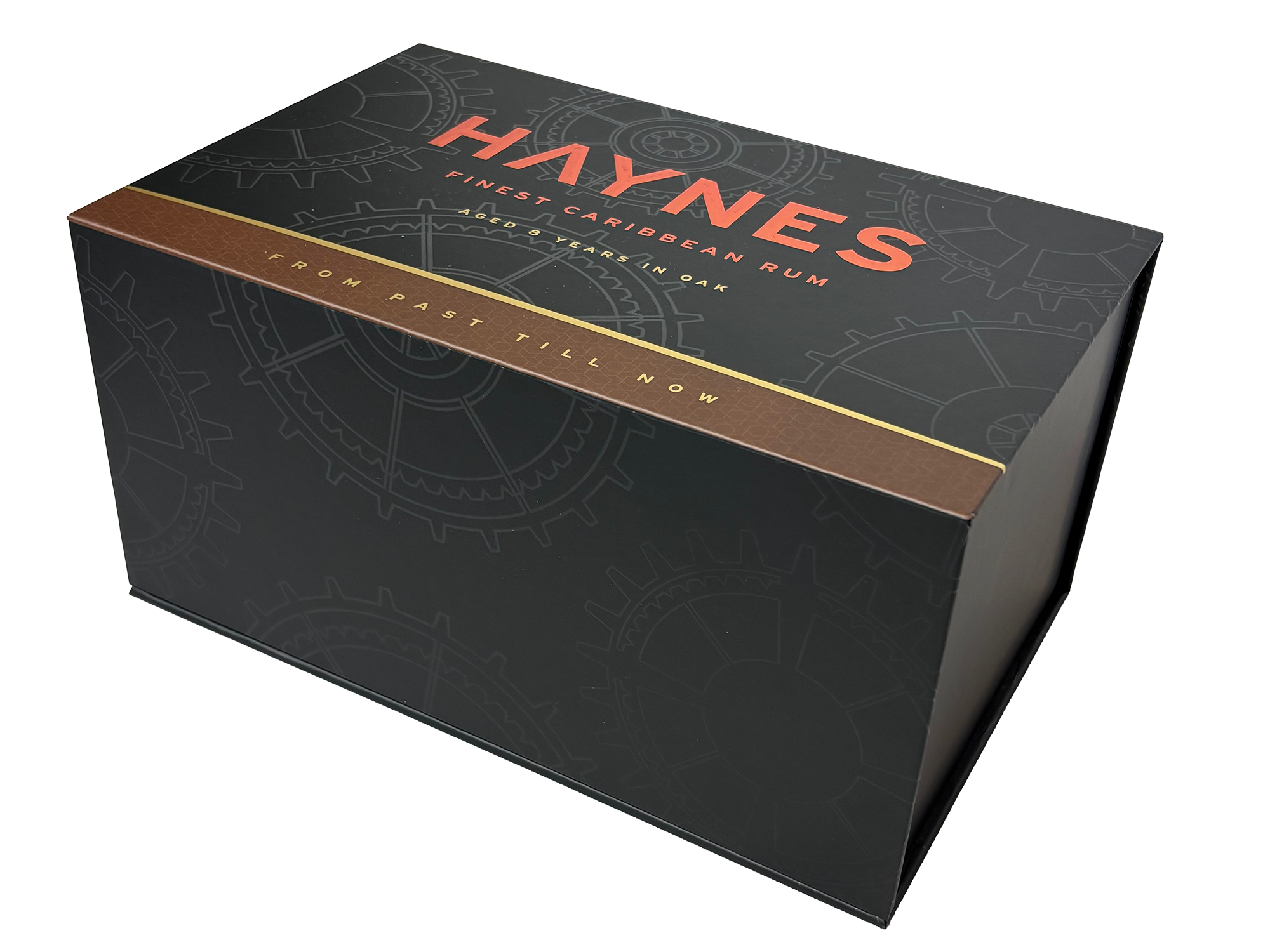 Black box labeled 'Haynes Finest Caribbean Rum' in red and gold text, with gear designs in the background. influencer boxes A&H packaging video boxes