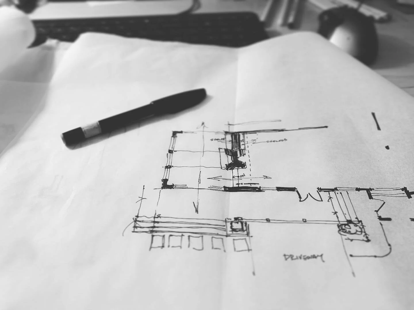Messy sketches help work through iterations quickly; this one focusing on flow and access from the existing spaces