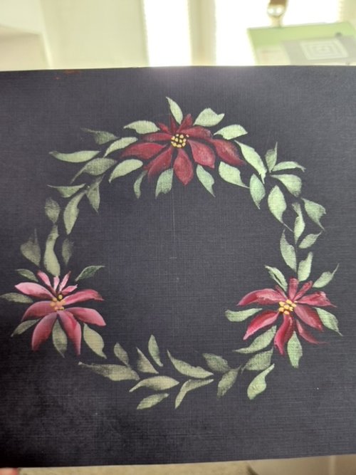 Wedgebrush wreath with pointsettia on black.jpg