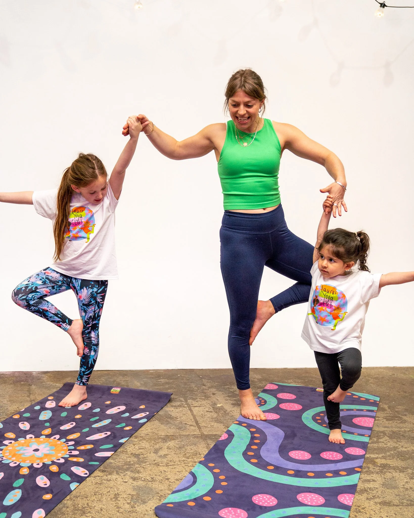 Laura from Laura’s Yoga Club demonstrating a children’s yoga pose during a kids yoga class