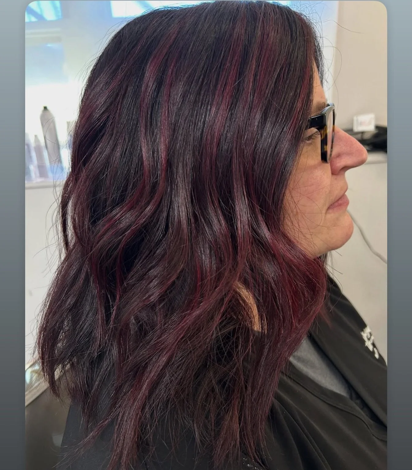 Red Wine 🍷 Rich dimension of reds, subtle hints of violet with a beautiful deep brunette base. Achieve this look in any hair color by booking our color retouch with full creative foil!