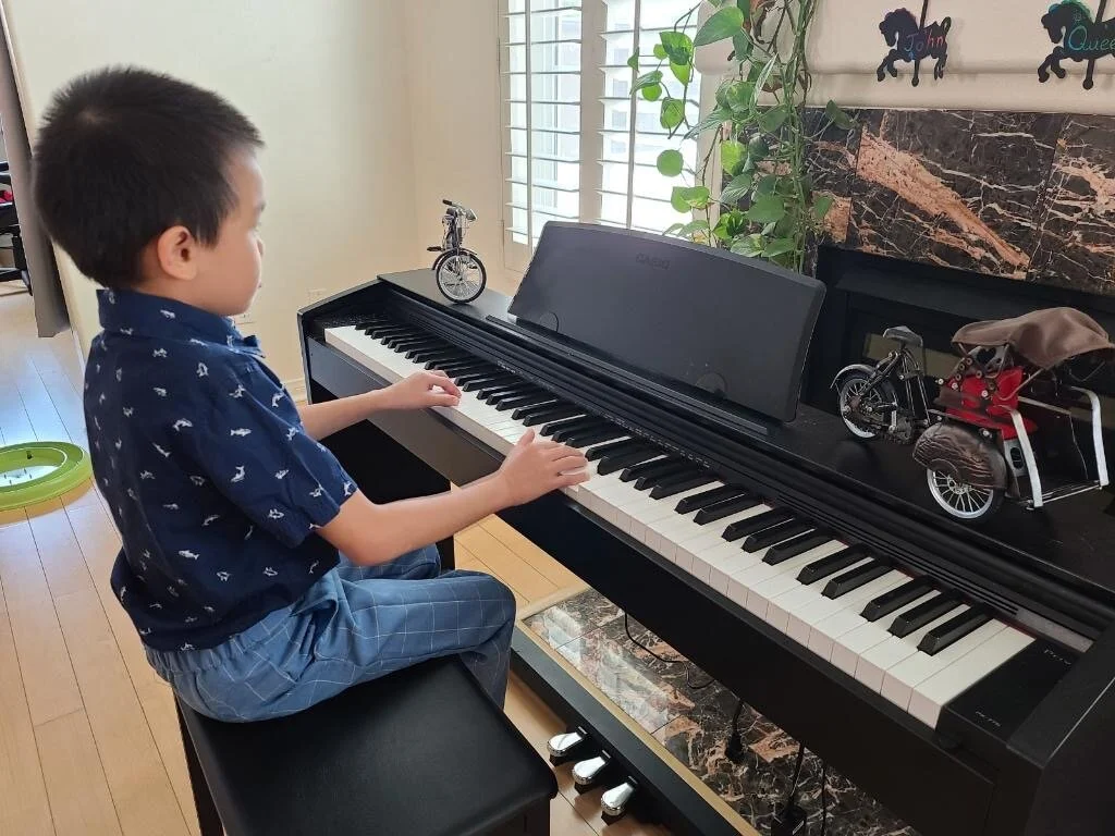 Perseus Liang - playing.JPG