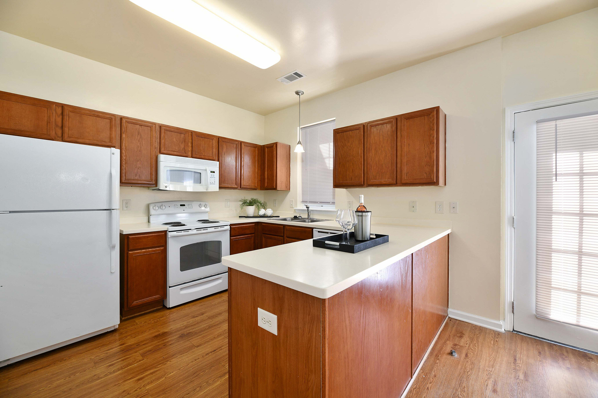  Kitchens with ample natural lighting and solid-surface countertops. 