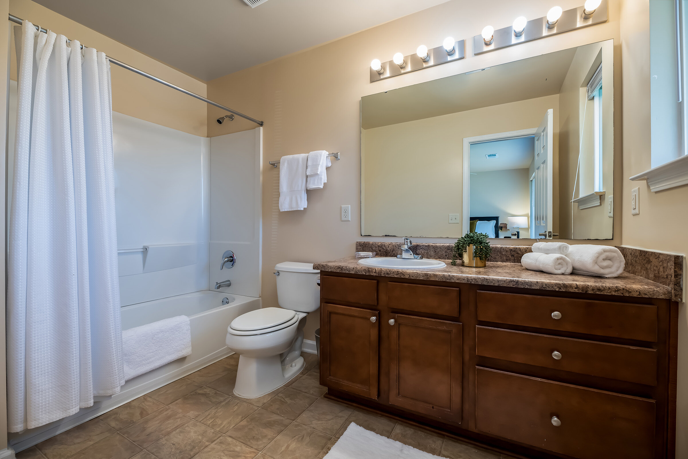  Thoughtfully designed bathrooms with solid-surface countertops at The Villages at Fort Moore. 