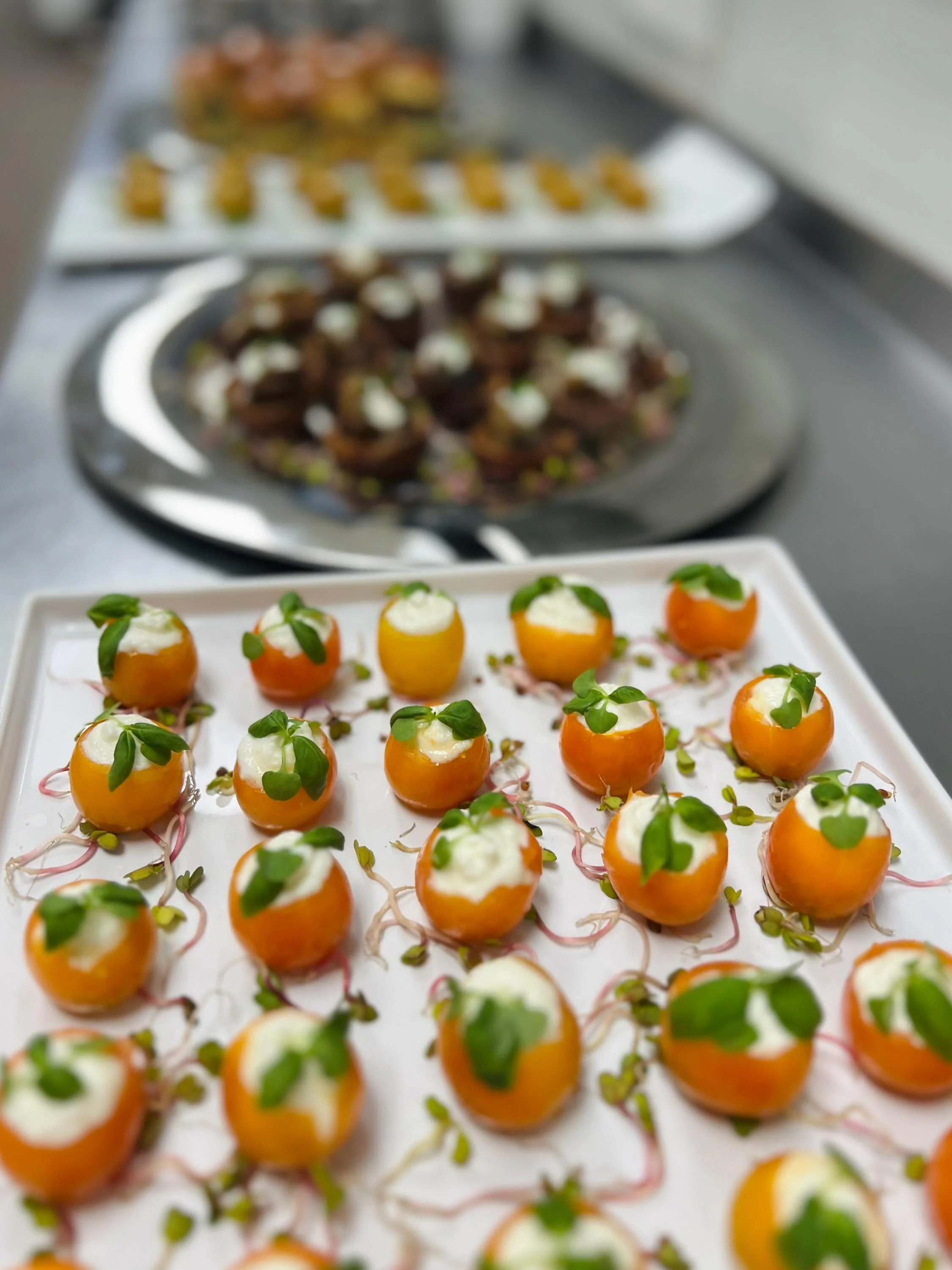 Behind the scenes of T&amp;O private events food - chef driven, fresh, and delicious! Pictured: cherry tomato cups filled with truffled burrata, and prosciutto &amp; melon salads. The perfect dishes for any party 🎉