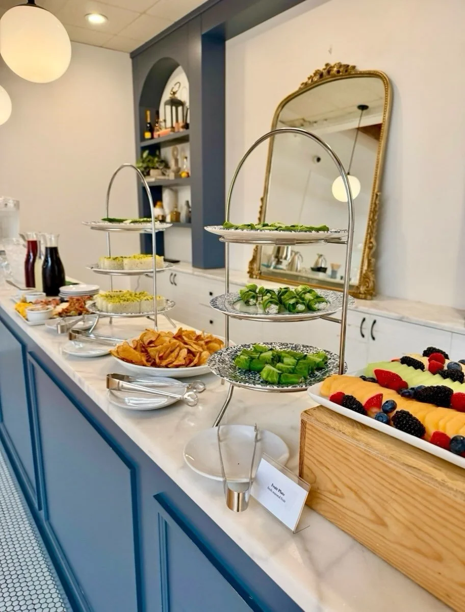 A lovely food station setup for a recent party in our private event space 🍽️ Tea sandwiches and tiered stands make for the best display!