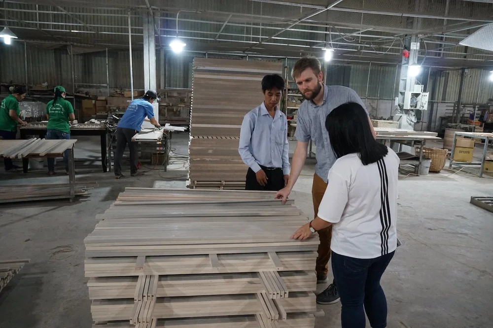 Jim Kennemer inspecting products at a Vietnamese factory