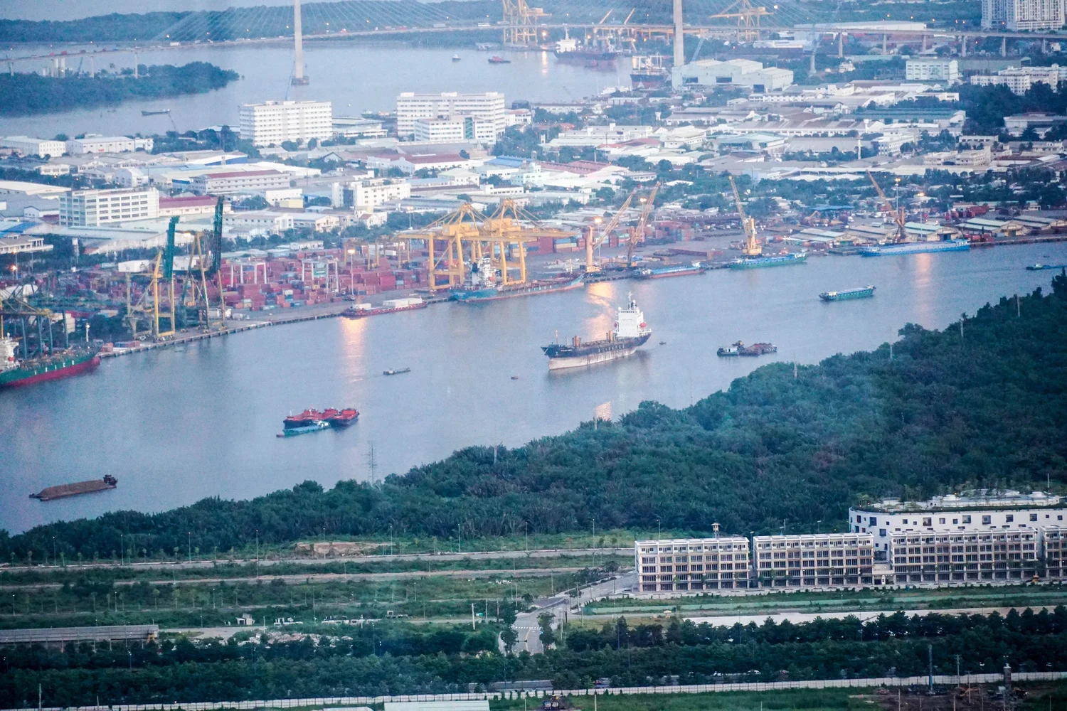 Container ship leaving Ben Nghe port in Ho Chi Minh City, Vietnam