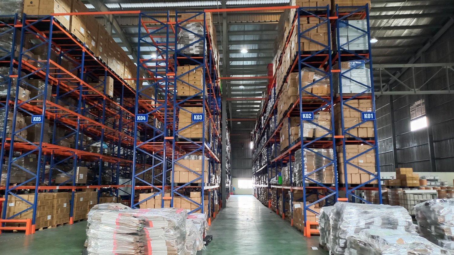 Cosmo Sourcing team at a warehouse facility in Vietnam