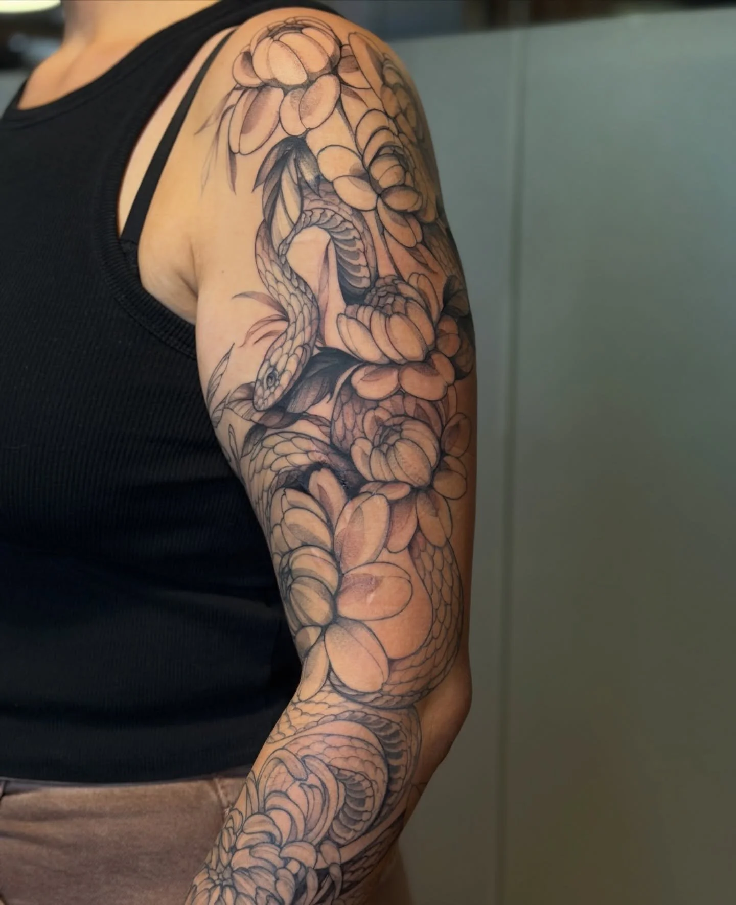 Progress on this floral &amp; snake sleeve done by @mariah.landers !
.
.
.
Artist: @mariah.landers 
Studio: @obscura.tattoo 
.
.
.
#ottawatattoo #obscuratattoo #floraltattoo #tattooideas