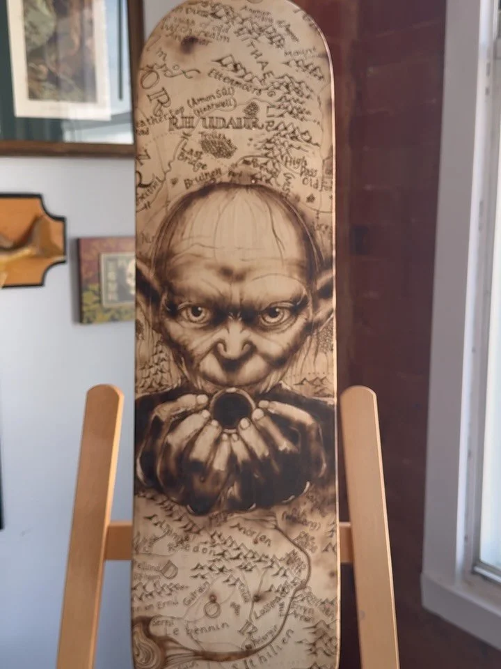 This Lord of the Rings deck is finally finished and off to its new home!

this was an incredibly fun project!! 
 I only take a handful of custom commission pieces per year. This was the last one of 2025 and I absolutely could not say no to this Gollu